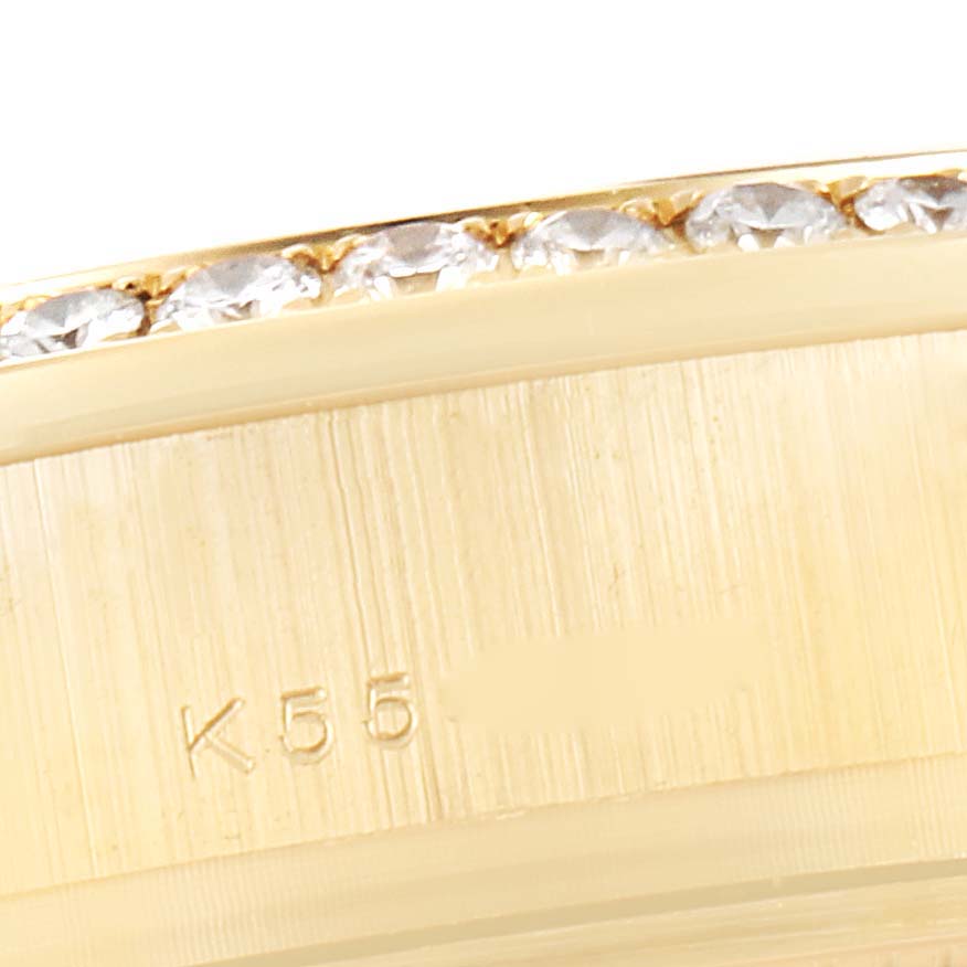 The image shows a close-up of the bezel with diamonds and part of the case of a Rolex President 179138 Women's Yellow Gold Mother of Pearl Dial 179138 Women's Yellow Gold Mother of Pearl Dial model watch.