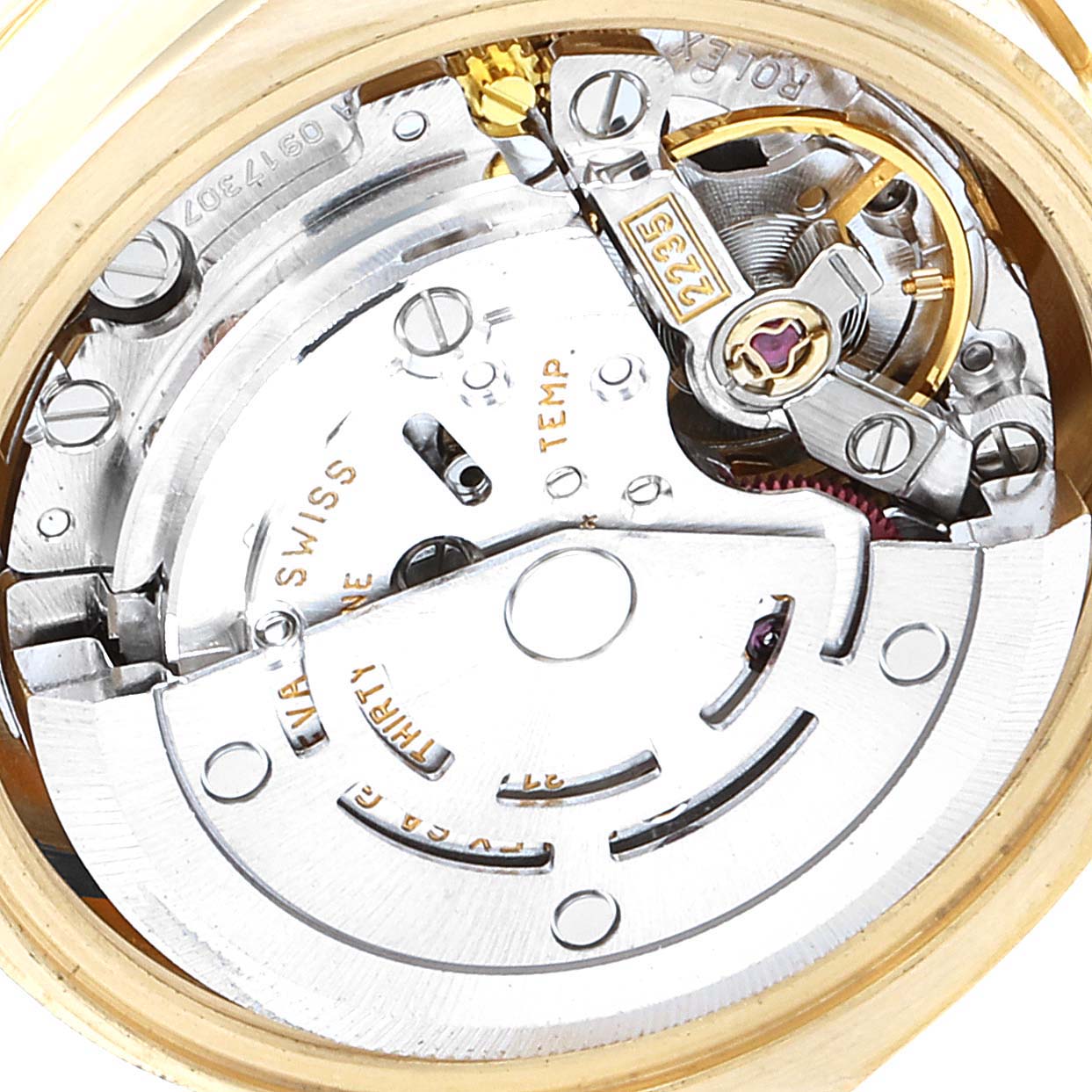 This is a close-up view of the internal mechanism of a Rolex President 179138 Women's Yellow Gold Mother of Pearl Dial 179138 Women's Yellow Gold Mother of Pearl Dial model watch, showing gears and components.