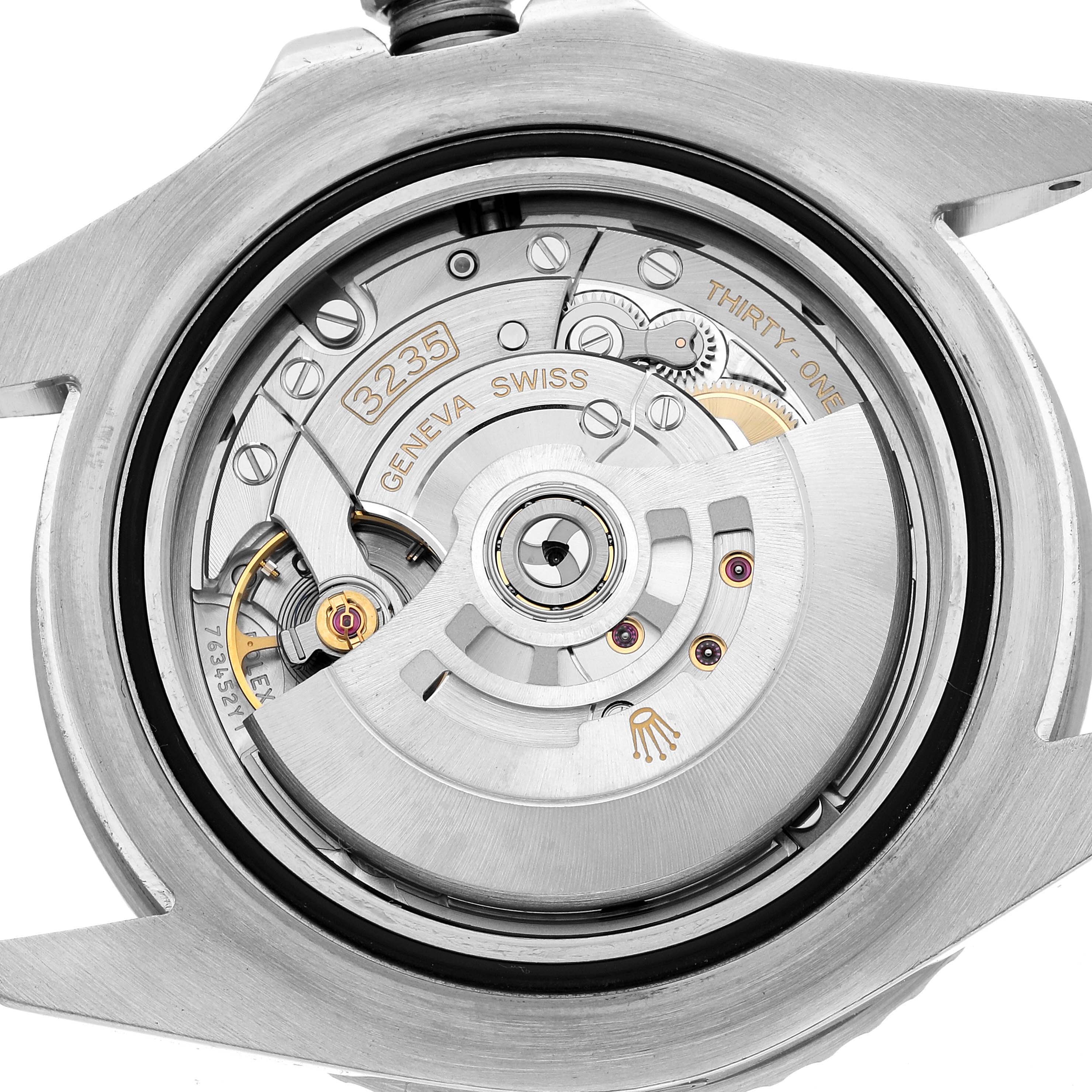 The image shows the movement of a Rolex Sea-Dweller 126600 Men's Stainless Steel Black Dial watch from the back, highlighting its intricate inner mechanisms.