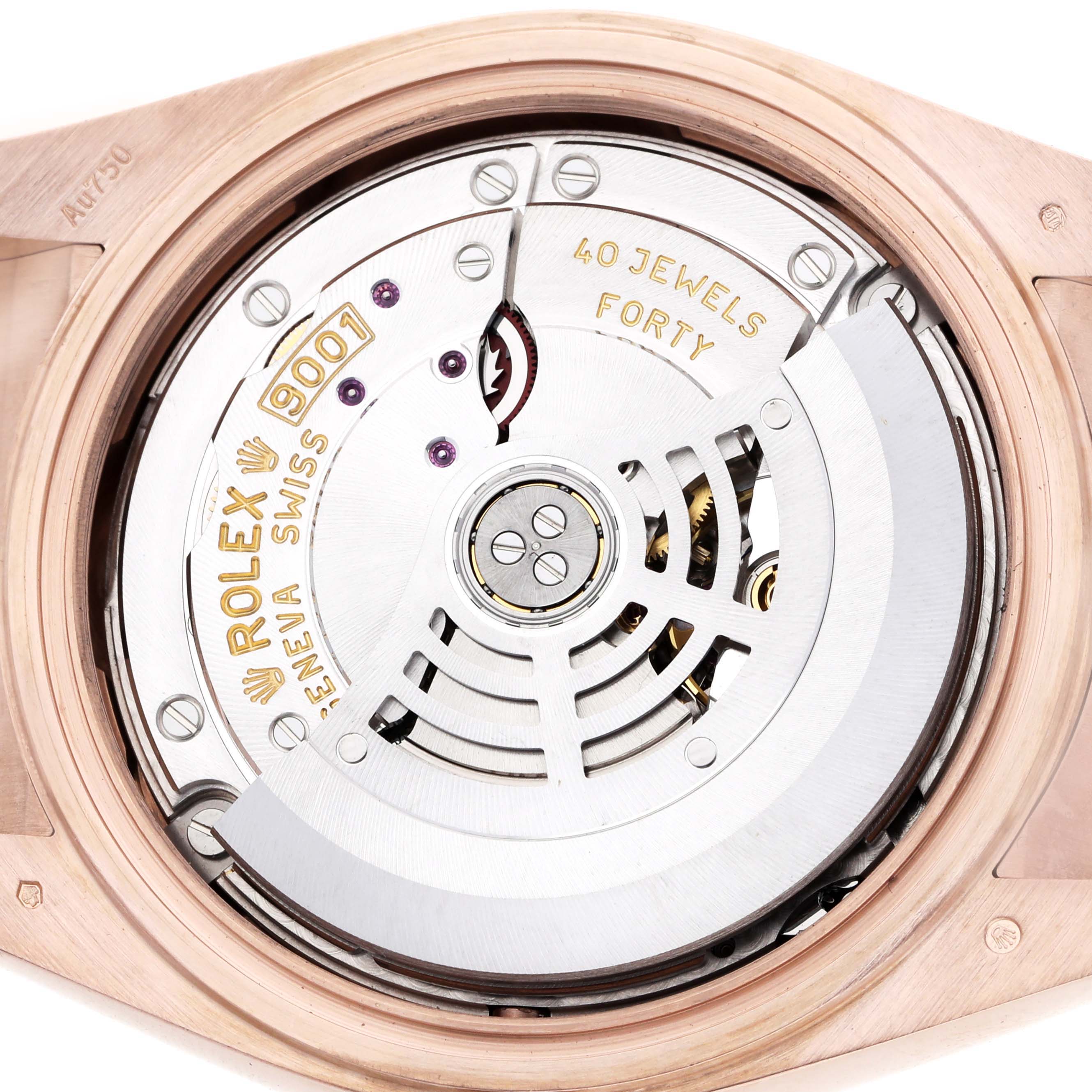The image shows a close-up of the movement from the back of a Rolex Sky-Dweller 326235 Men's Rose Gold Brown Dial, highlighting its machinery and "40 JEWELS" inscription.