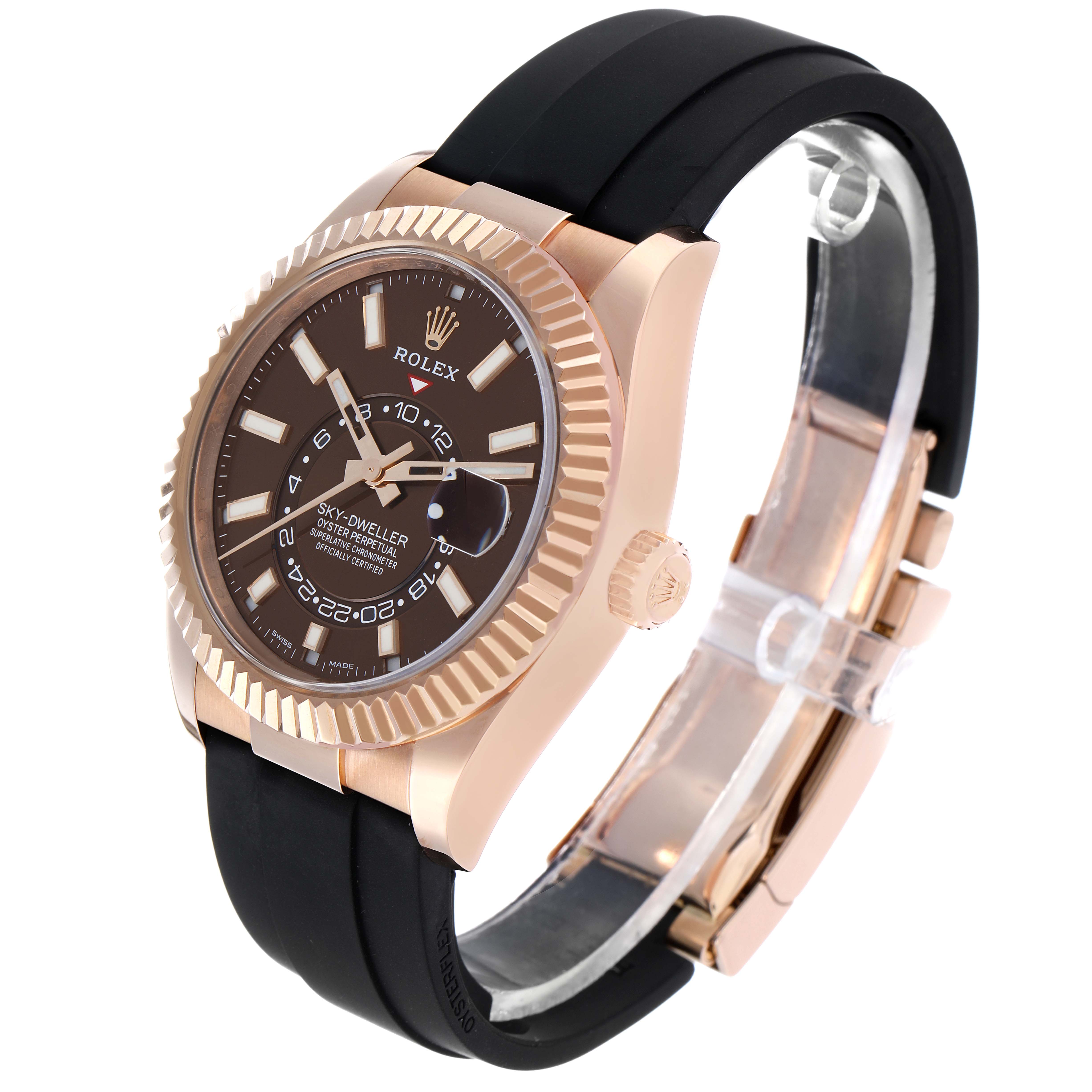 The Rolex Sky-Dweller 326235 Men's Rose Gold Brown Dial watch is shown at a three-quarter angle, highlighting its face, bezel, crown, and strap.