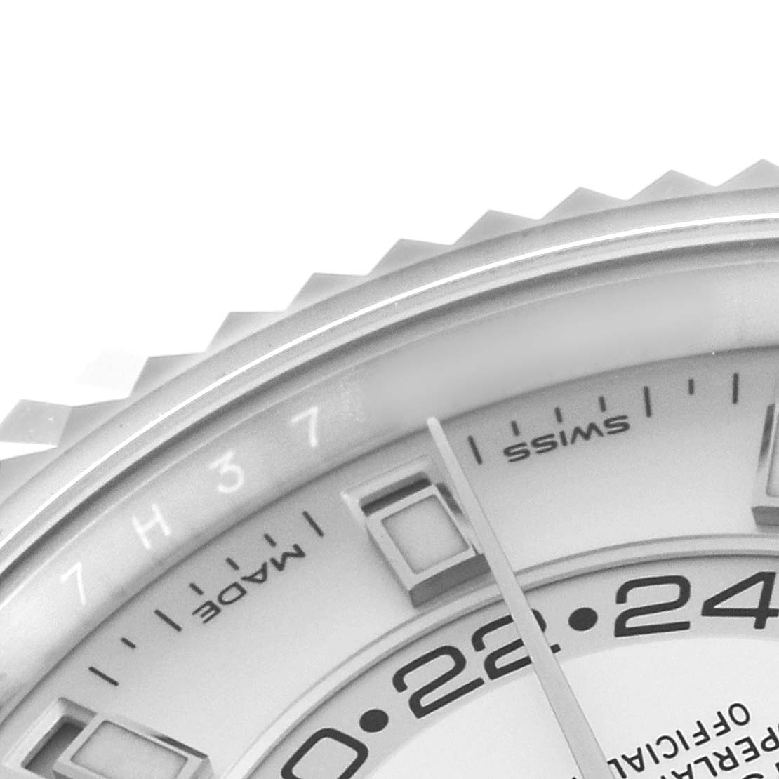 The image shows a close-up of the Rolex Sky-Dweller 336934 Men's Stainless Steel White Dial watch, focusing on the bezel and part of the dial with markings.