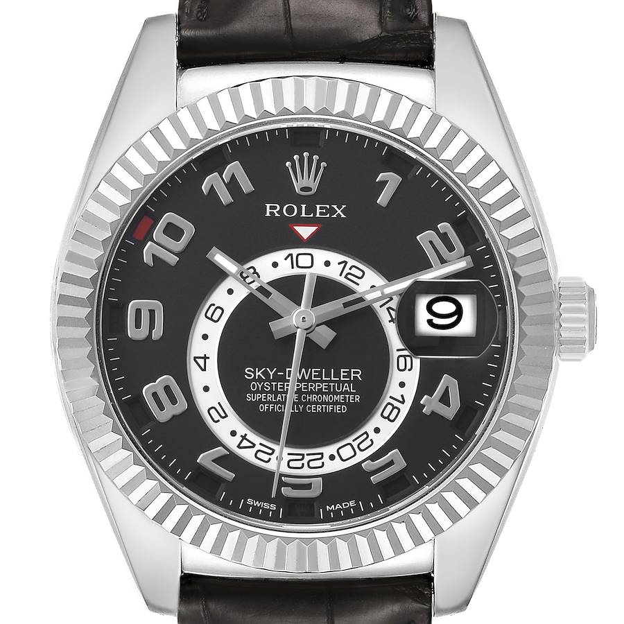 The Rolex Sky-Dweller 326139 Men's White Gold Black Dial watch is shown from the front, highlighting the dial, hour markers, bezel, and part of the leather strap.