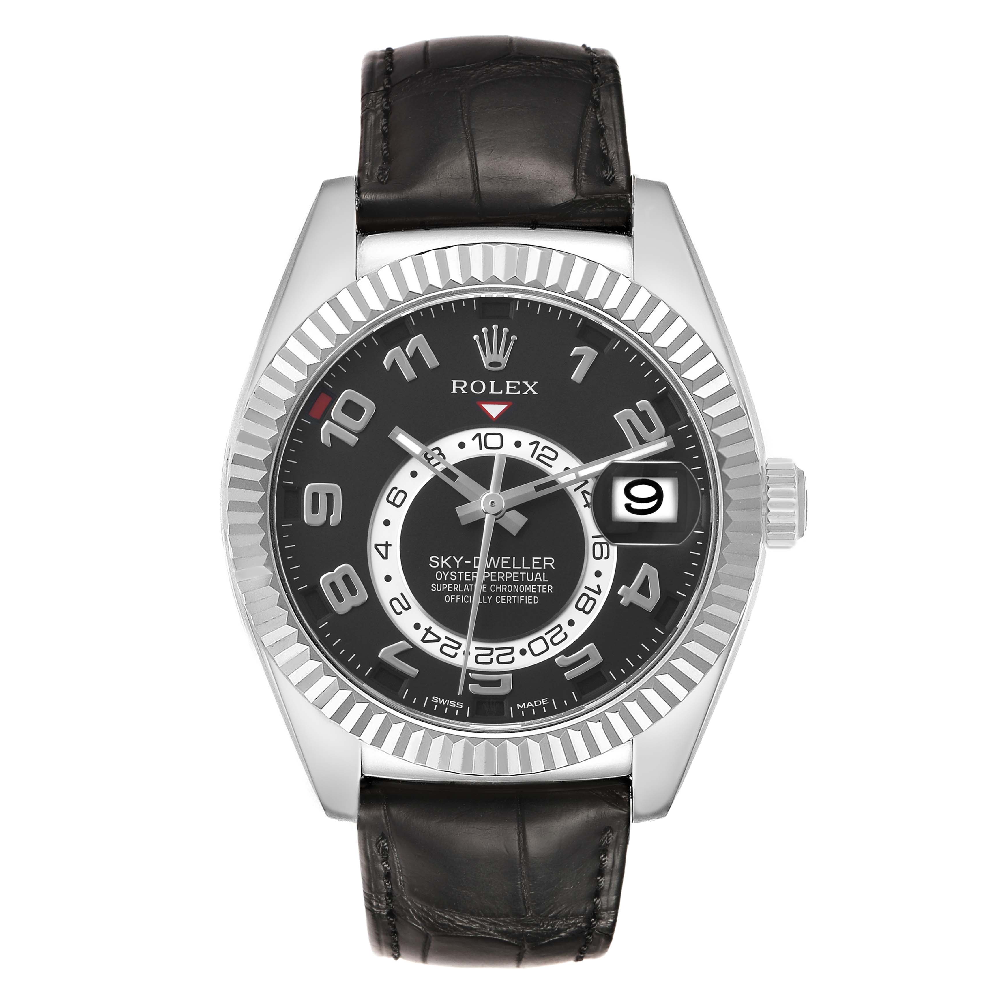 The Rolex Sky-Dweller 326139 Men's White Gold Black Dial watch is shown from a front angle, displaying its face, bezel, strap, and crown.