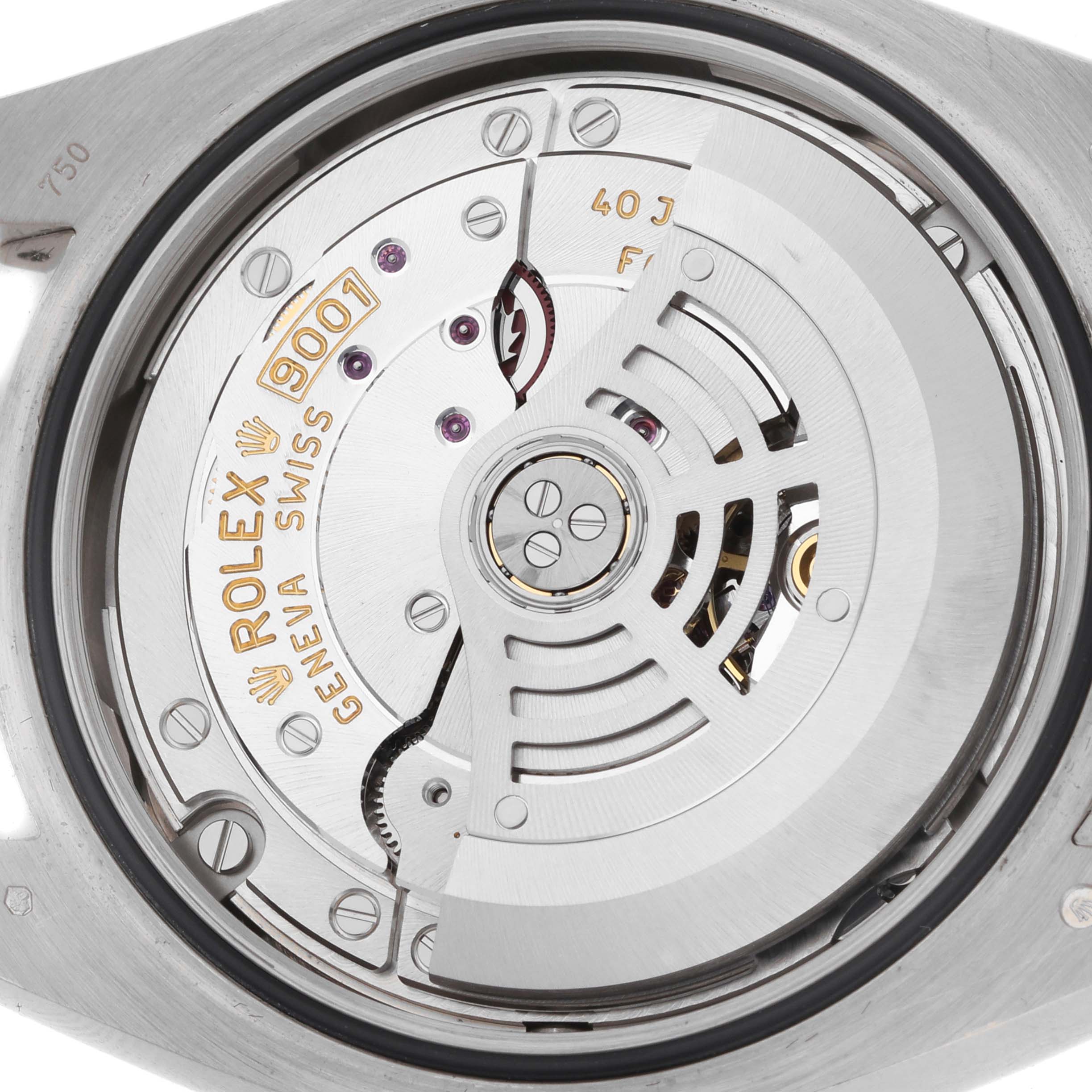 The image shows a close-up of the Rolex Sky-Dweller 326139 Men's White Gold Black Dial's movement from the back, highlighting its intricate mechanical parts and engravings.