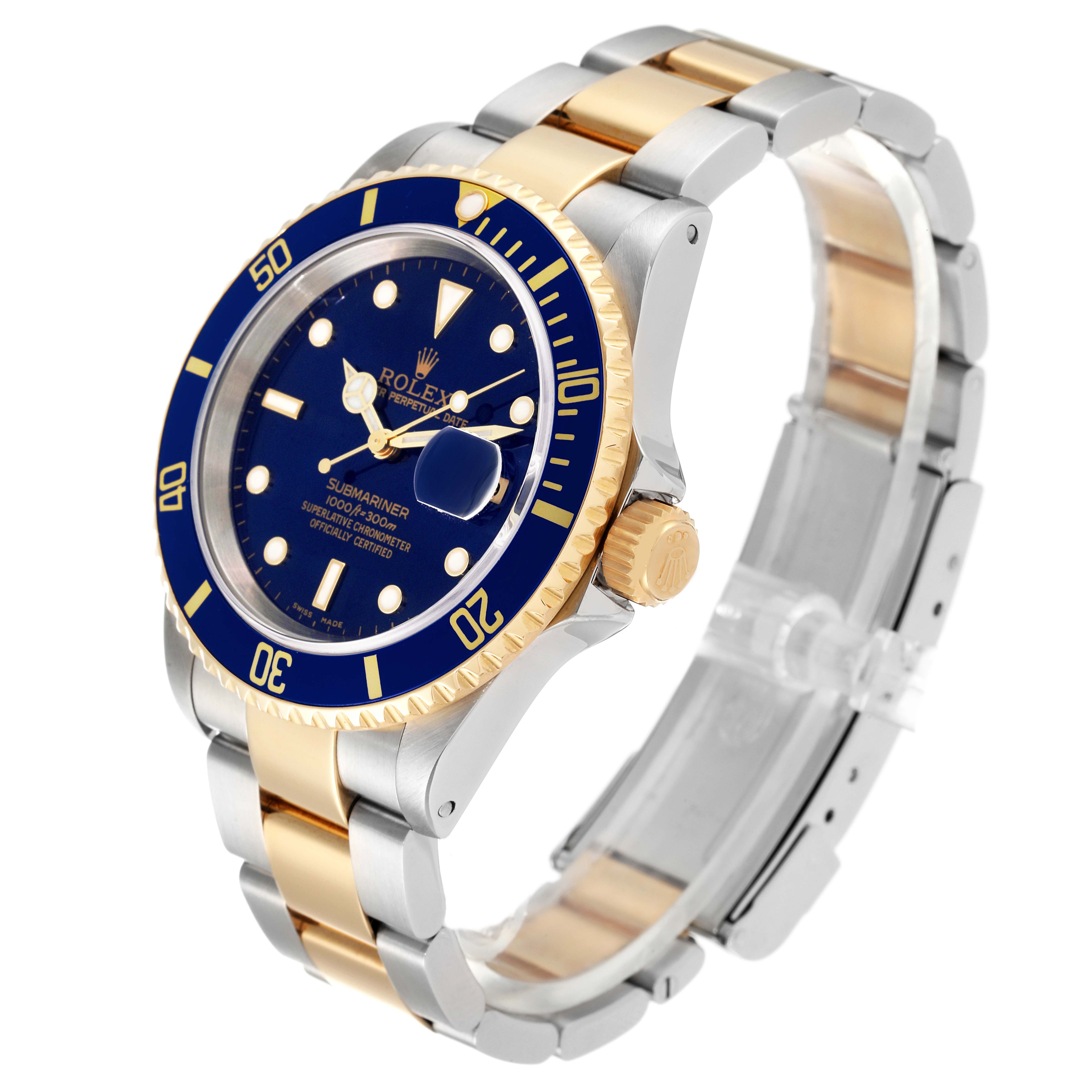 The image shows a Rolex Submariner 16613 Men's Steel and Gold (two tone) Blue Dial 16613 Men's Steel and Gold (two tone) Blue Dial watch at an angle highlighting its blue and gold bezel, dial, case, and two-tone bracelet.