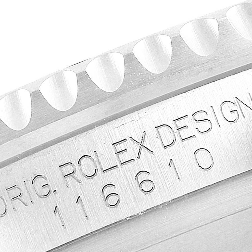 The image shows a close-up of the case side and bezel of the Rolex Submariner 116610LV Men's Stainless Steel Green Dial 116610LV Men's Stainless Steel Green Dial model, displaying the model and design engraving.