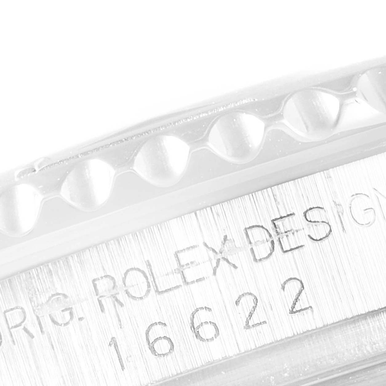 This close-up image shows the side engraving on a Rolex Yacht-Master 16622 Men
s Stainless Steel Silver Dial 16622 Men
s Stainless Steel Silver Dial watch, highlighting the model number and Rolex branding.