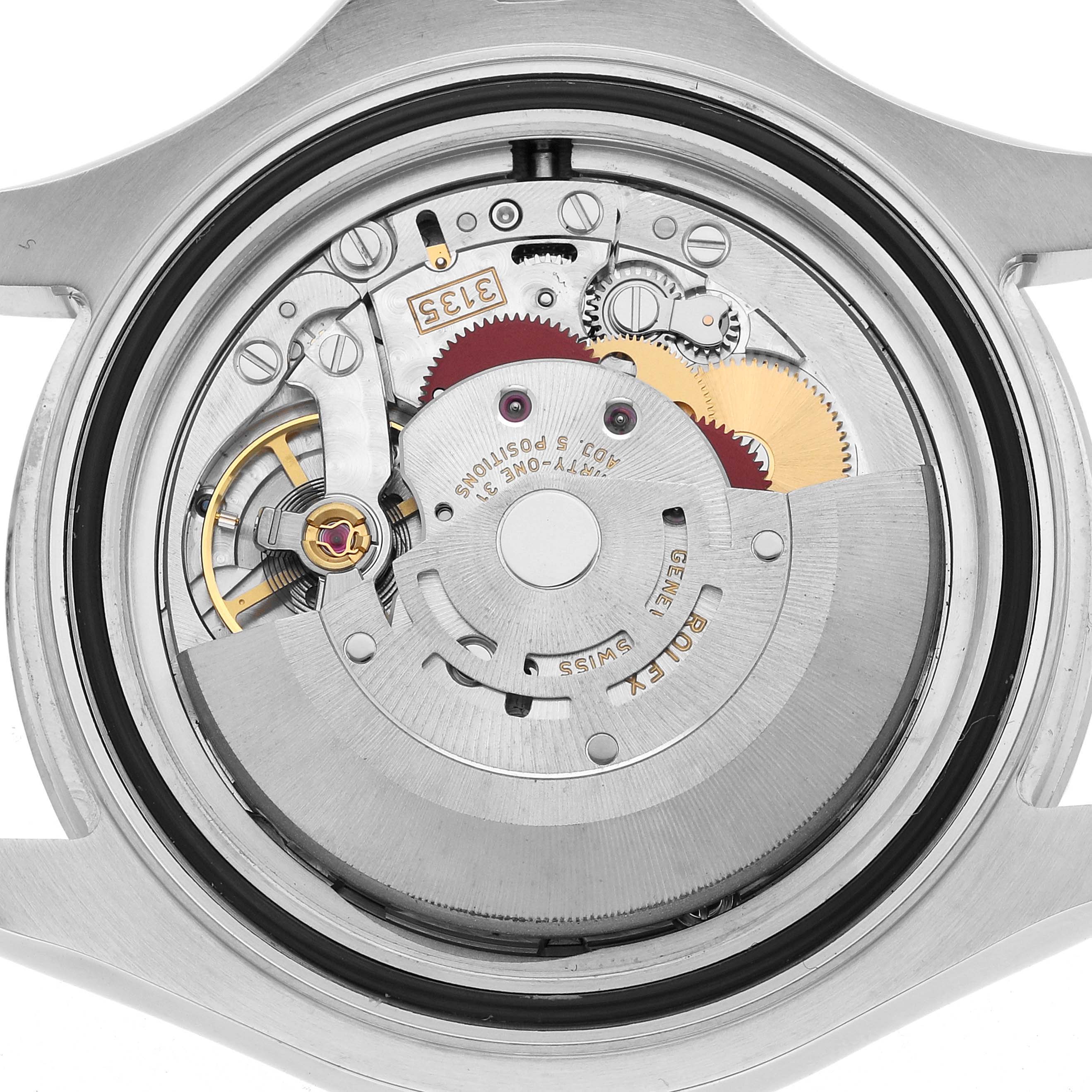The image shows the internal mechanism of the Rolex Yacht-Master 116622 Men's Stainless Steel Grey Dial watch from a back view, highlighting gears and other components.