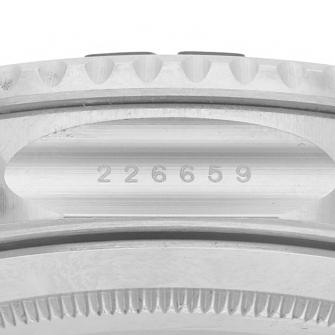 The image shows the side profile of a Rolex Yacht-Master 226659 Men's White Gold Black Dial, highlighting the bezel and serial number engraving.