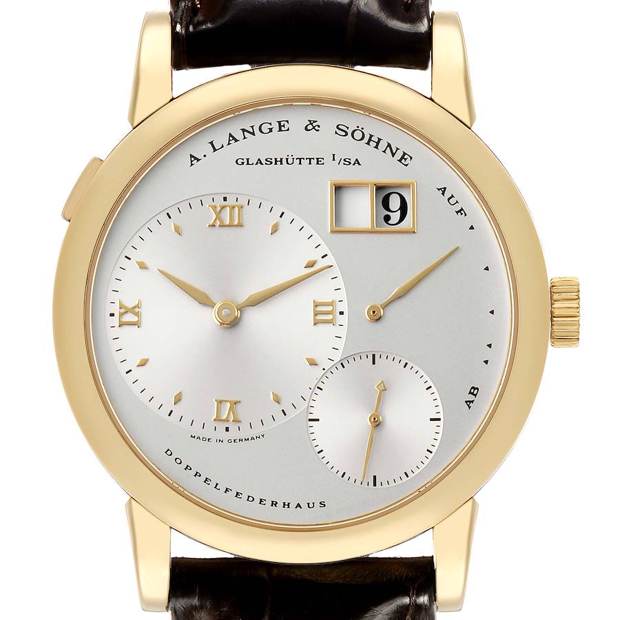 The image shows a front view of the A. Lange & Sohne Lange 1 101.021 Men's Yellow Gold Silver Dial, highlighting its dial, date, and power reserve indicator.