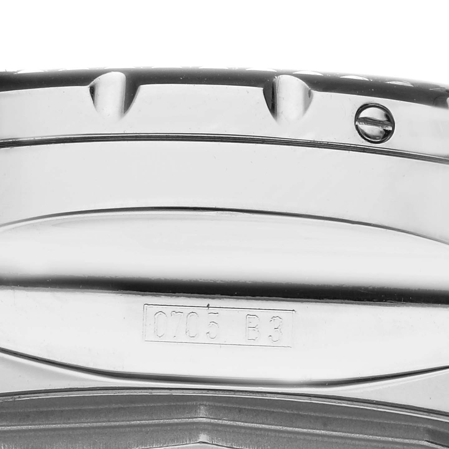 The image shows a close-up of the side view of a Breitling Bentley A25362 Men
s Stainless Steel Blue Dial A25362 Men
s Stainless Steel Blue Dial watch, highlighting the bezel and casing details.