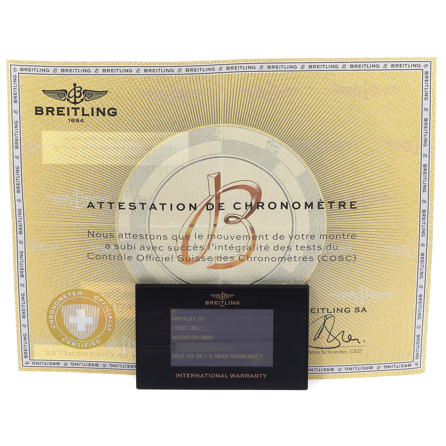 This image shows the warranty card and chronometer certificate for a Bentley model by Breitling.