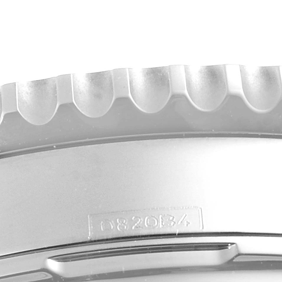 This image shows a close-up of the bezel and part of the case back of the Breitling Navitimer AB0121C4-C920-731P Men
s Stainless Steel Blue Dial AB0121C4-C920-731P Men
s Stainless Steel Blue Dial watch.