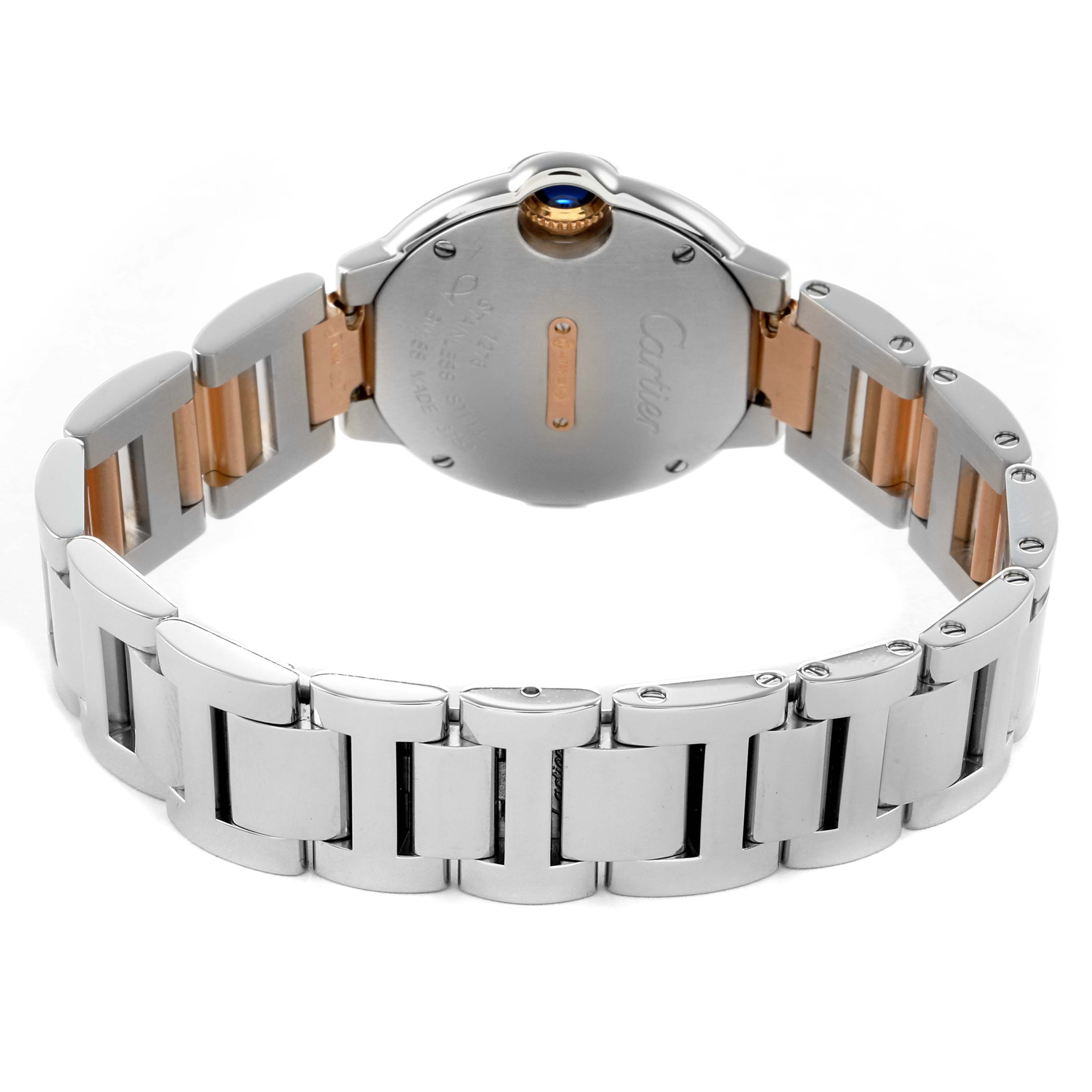 The image shows the back and side view of a Ballon Bleu by Cartier, highlighting the bracelet and caseback.