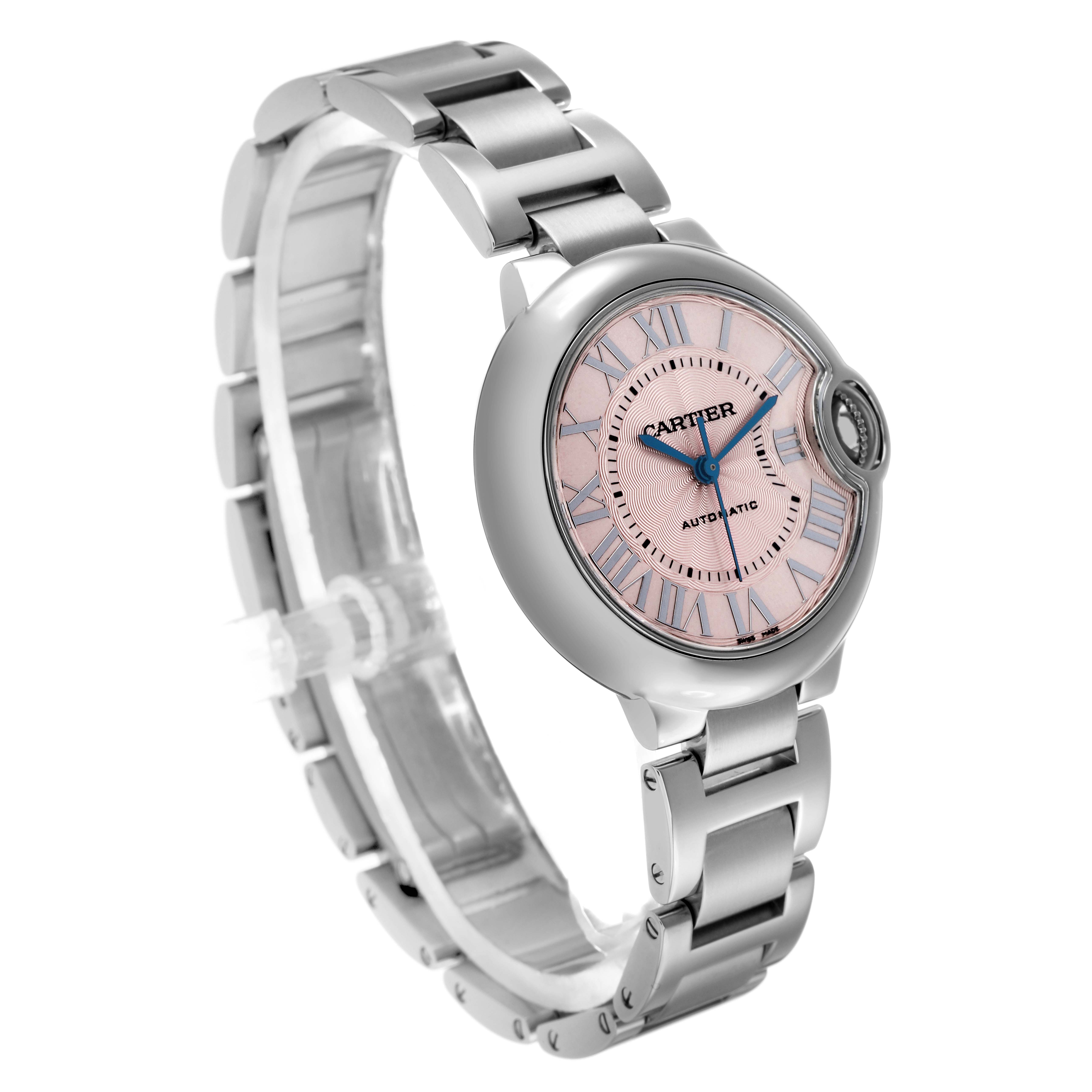The Cartier Ballon Bleu W6920100 Women's Stainless Steel Pink Dial watch is shown at a three-quarter angle highlighting its face, crown, and metal bracelet.