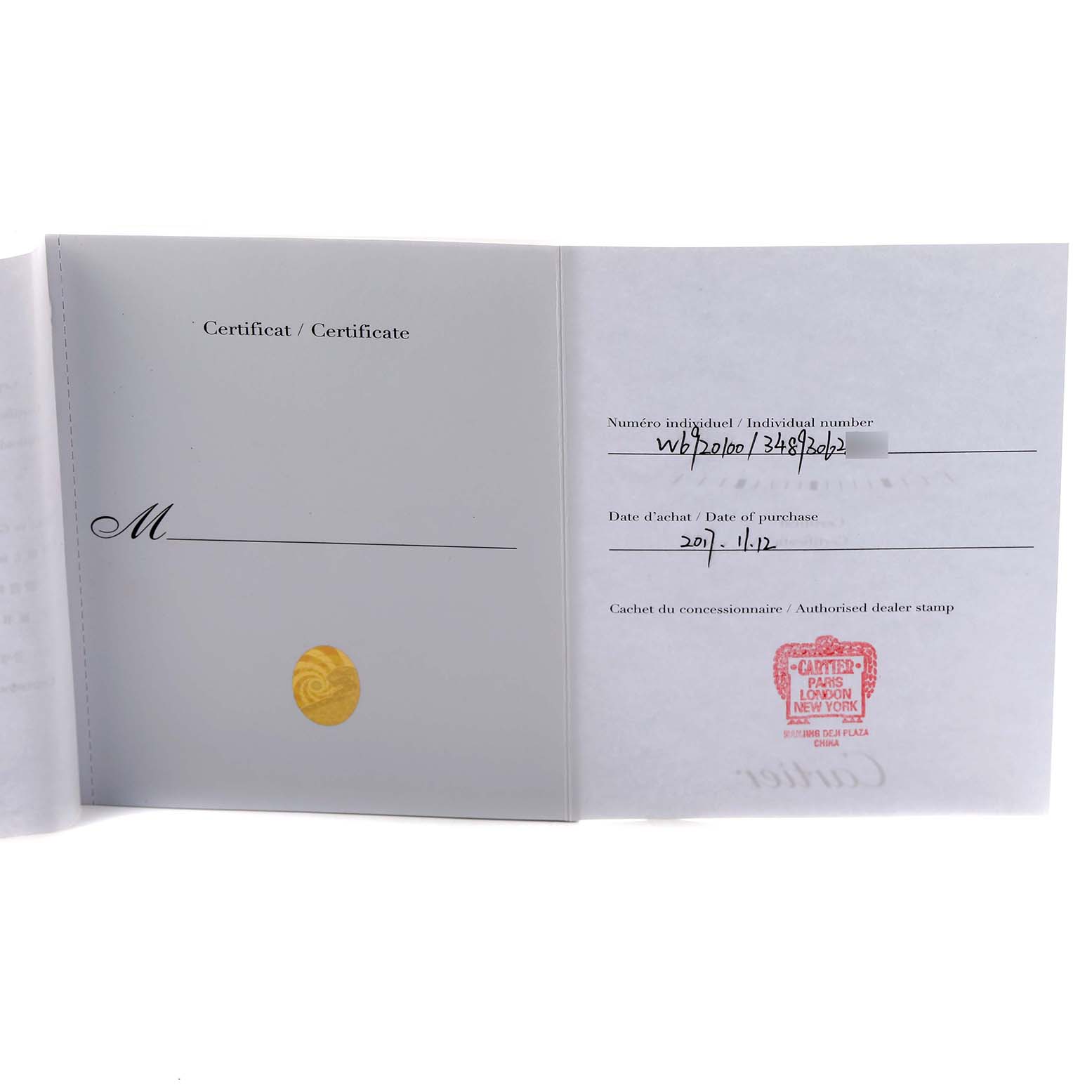 The image shows the open certificate booklet for the Cartier Ballon Bleu W6920100 Women's Stainless Steel Pink Dial watch.