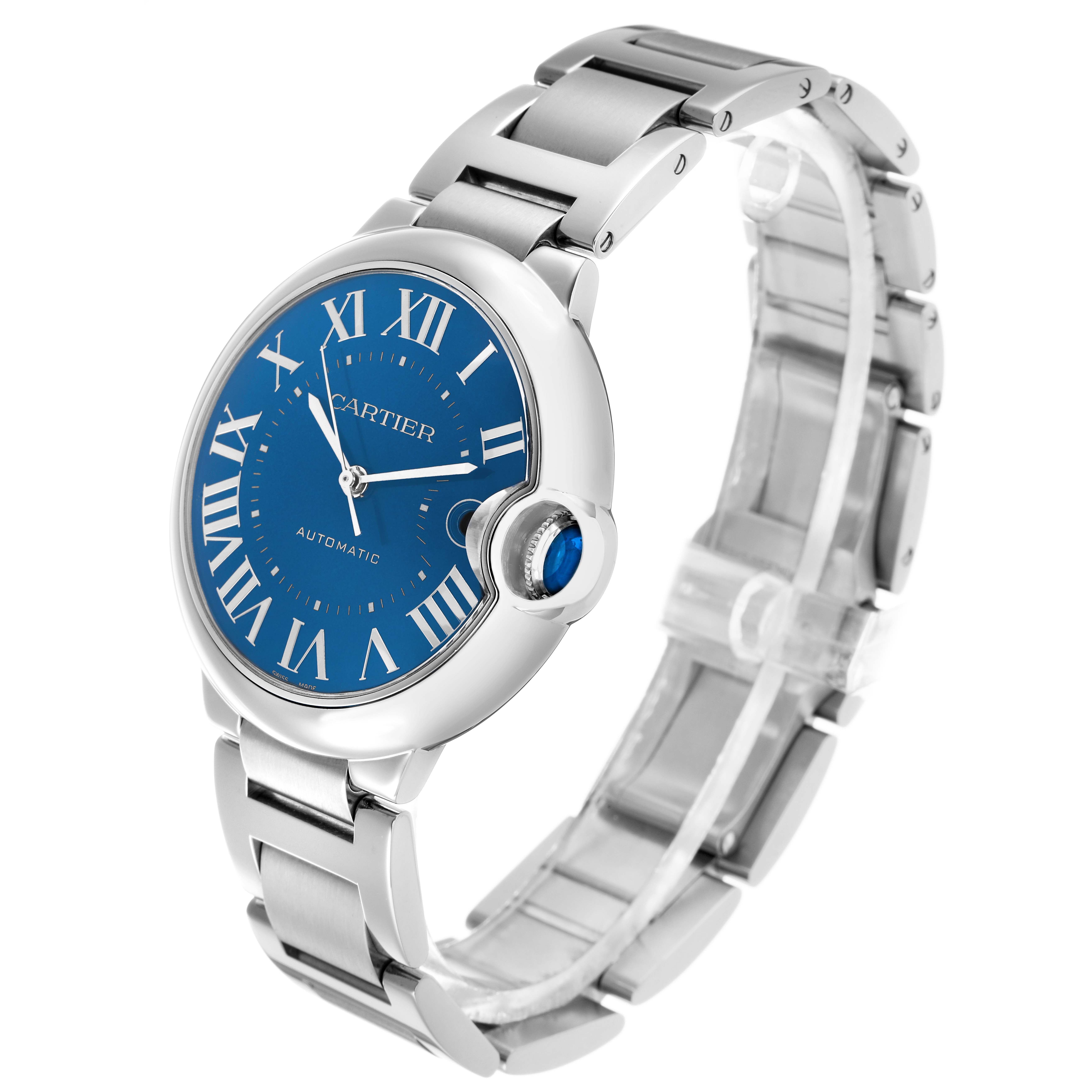 The Cartier Ballon Bleu WSBB0061 Men's Stainless Steel Blue Dial watch is shown at a slight angle, highlighting the blue dial, Roman numerals, metal bracelet, and crown.