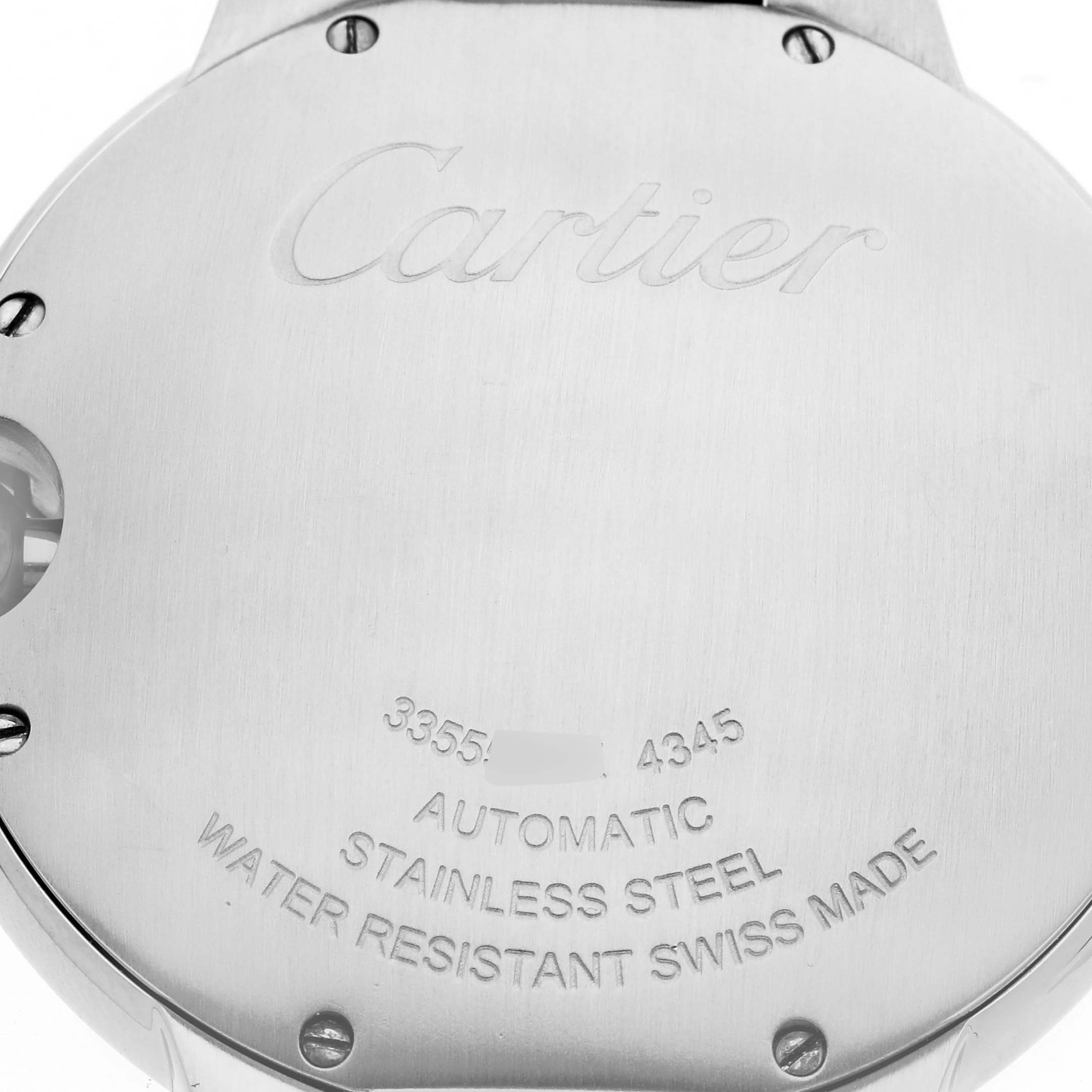 The image shows the back of a Cartier Ballon Bleu WSBB0061 Men's Stainless Steel Blue Dial watch, highlighting engravings and the stainless steel case.