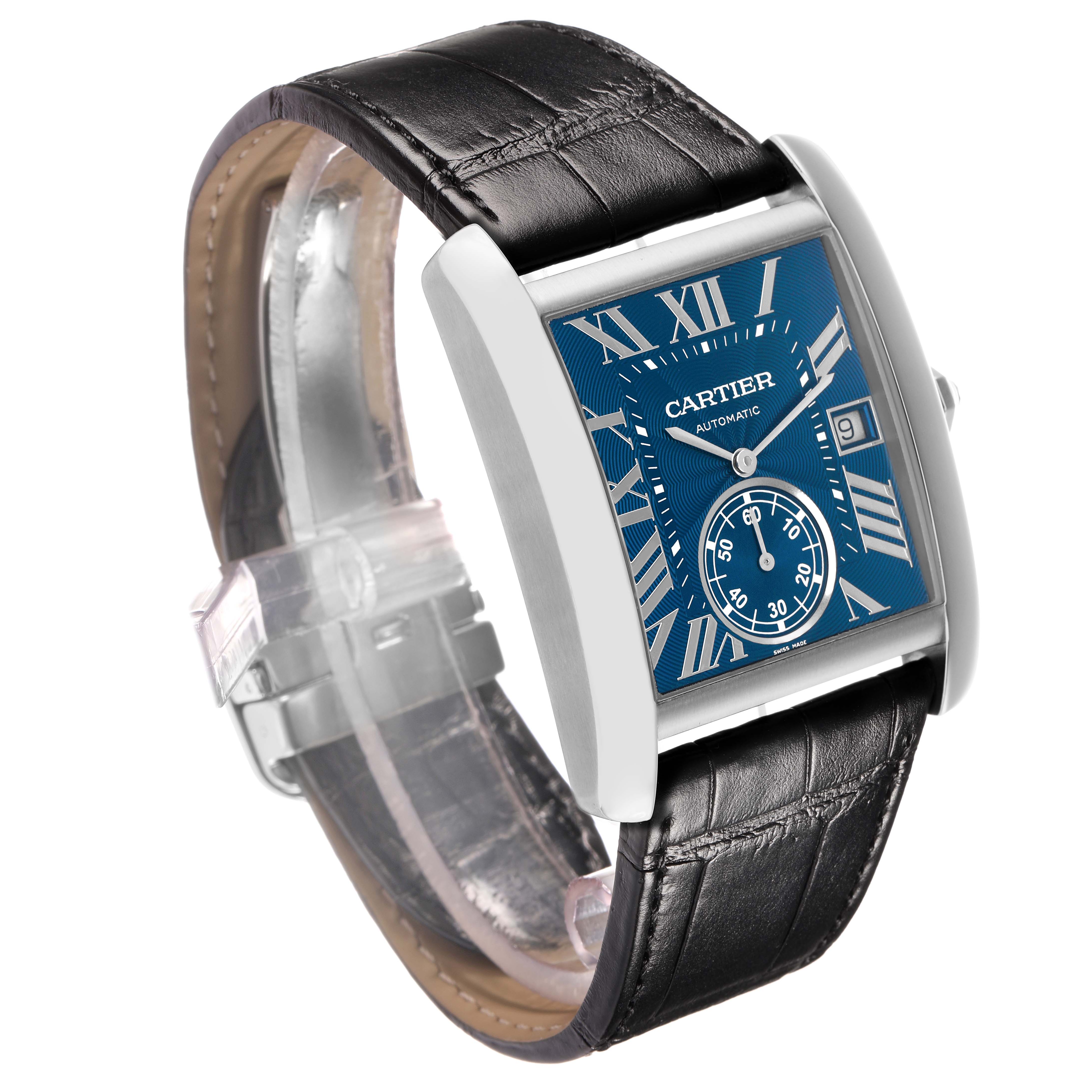 The Cartier Tank MC WSTA0010 Men's Stainless Steel Blue Dial watch is shown at a side angle, highlighting the blue dial, Roman numerals, subdial, and black leather strap.