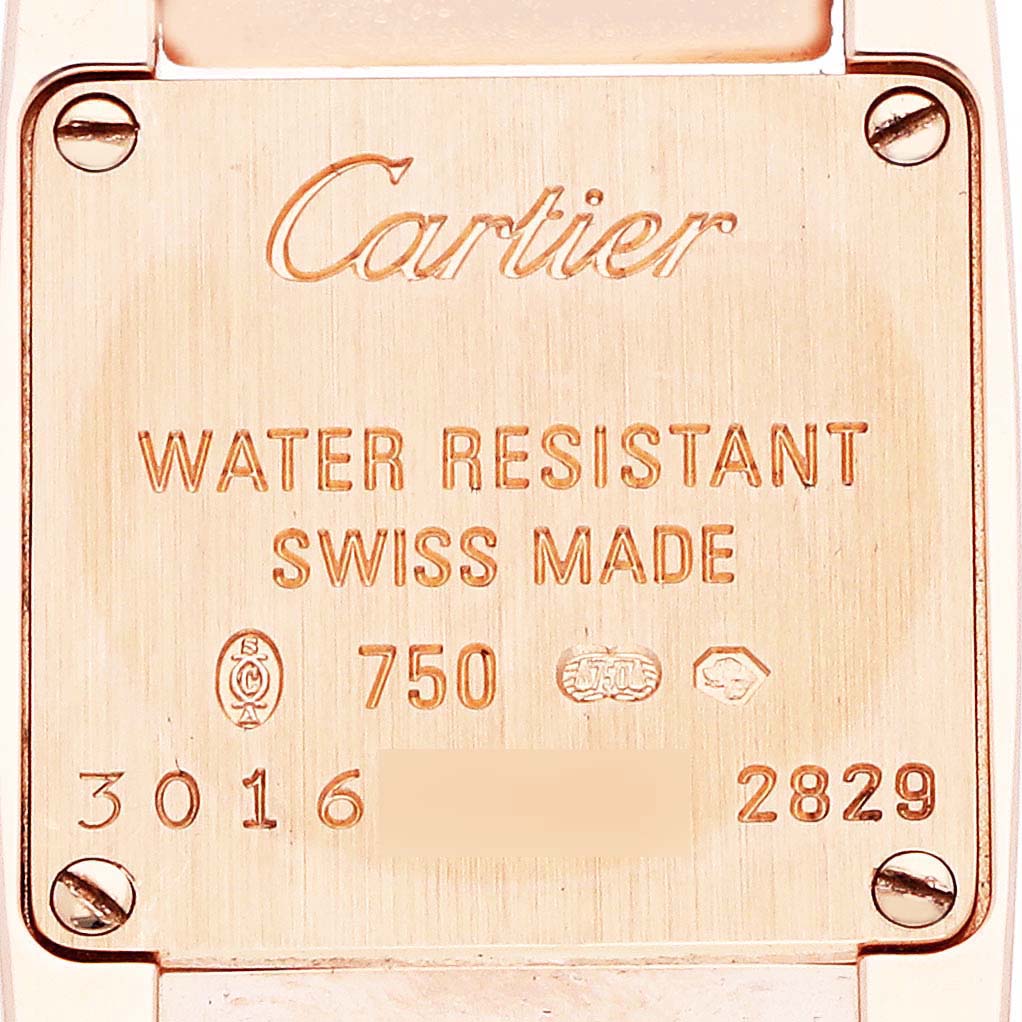The image shows the back case of the Cartier Tankissime WE70058H Women's Rose Gold Silver Dial watch, highlighting the brand, model, and inscriptions.