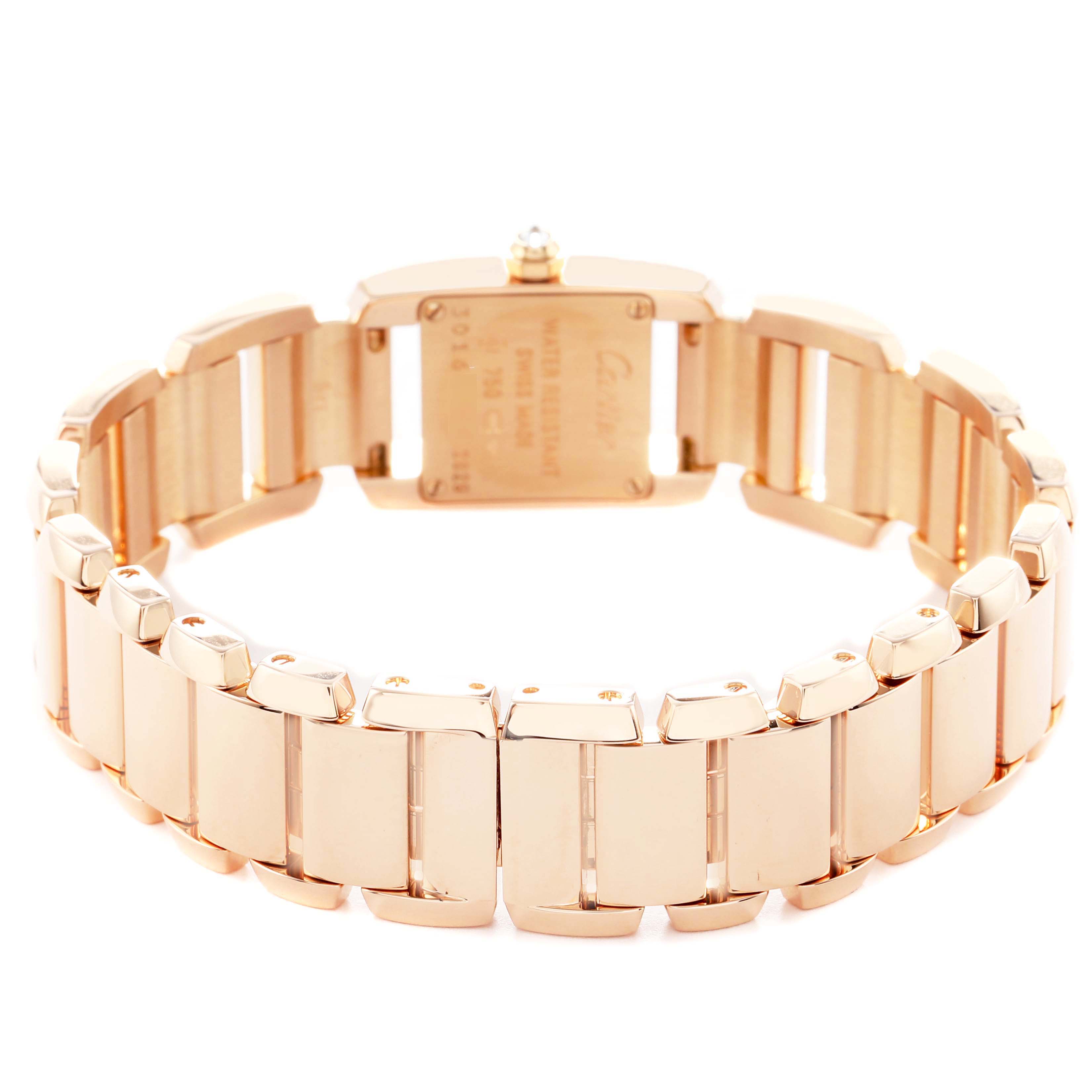 The image shows the back view of the Cartier Tankissime WE70058H Women's Rose Gold Silver Dial watch, highlighting its gold bracelet and case back.