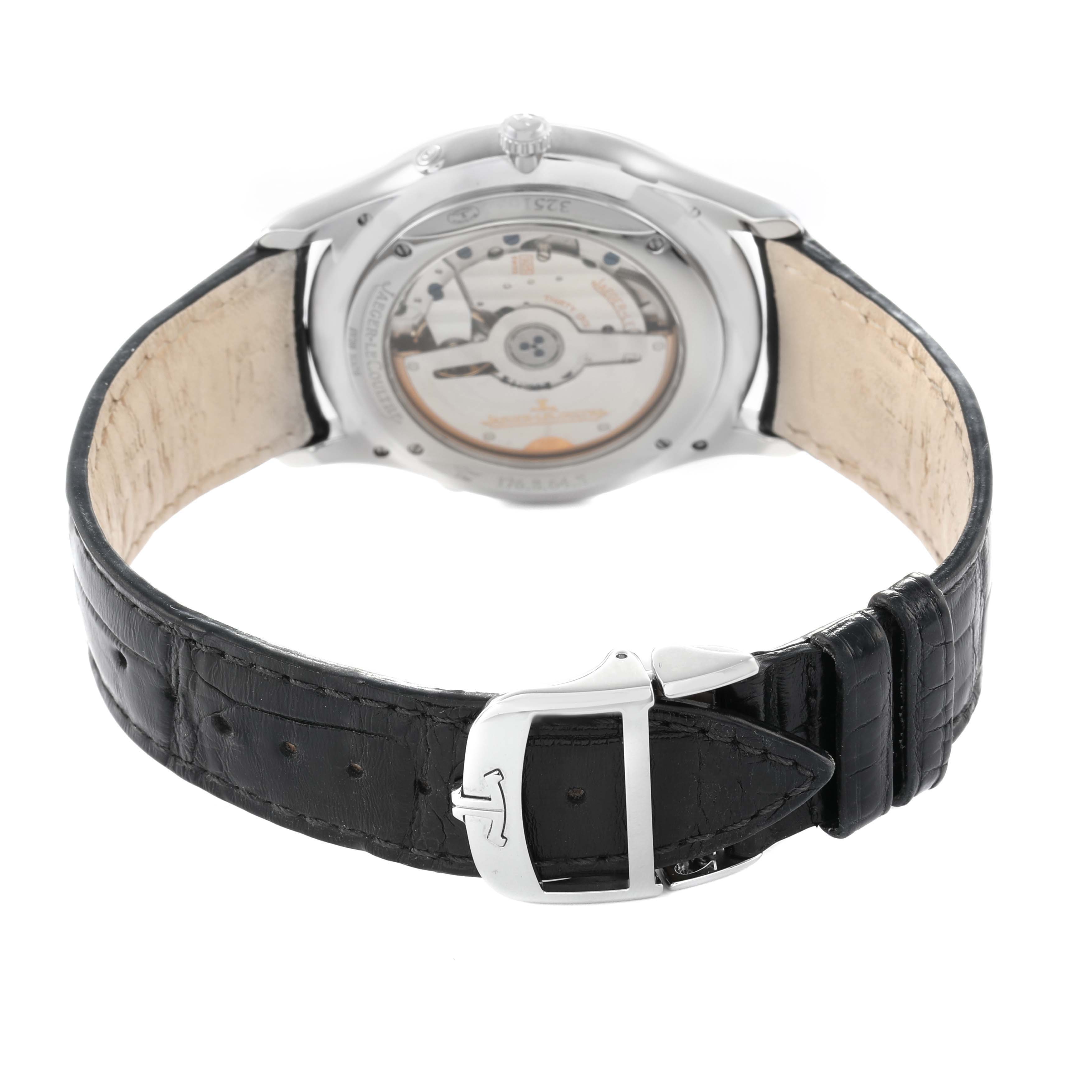 The image shows the back view of a Jaeger LeCoultre Master Q1368420 Men's Stainless Steel Silver Dial model, highlighting the open case back and leather strap with a clasp.