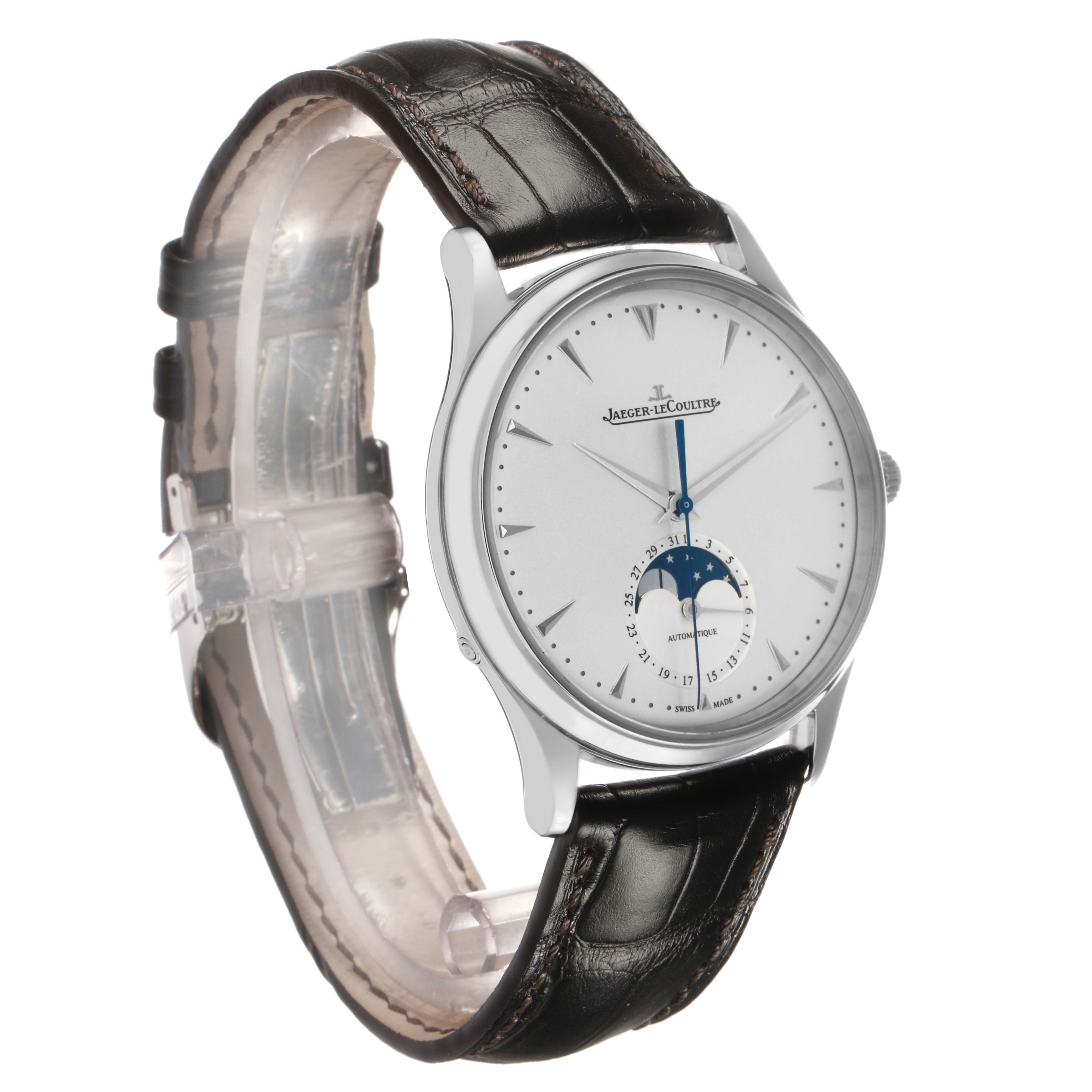 The Jaeger-LeCoultre Master model is shown at a slight angle, highlighting the silver dial, moon phase, and leather strap.
