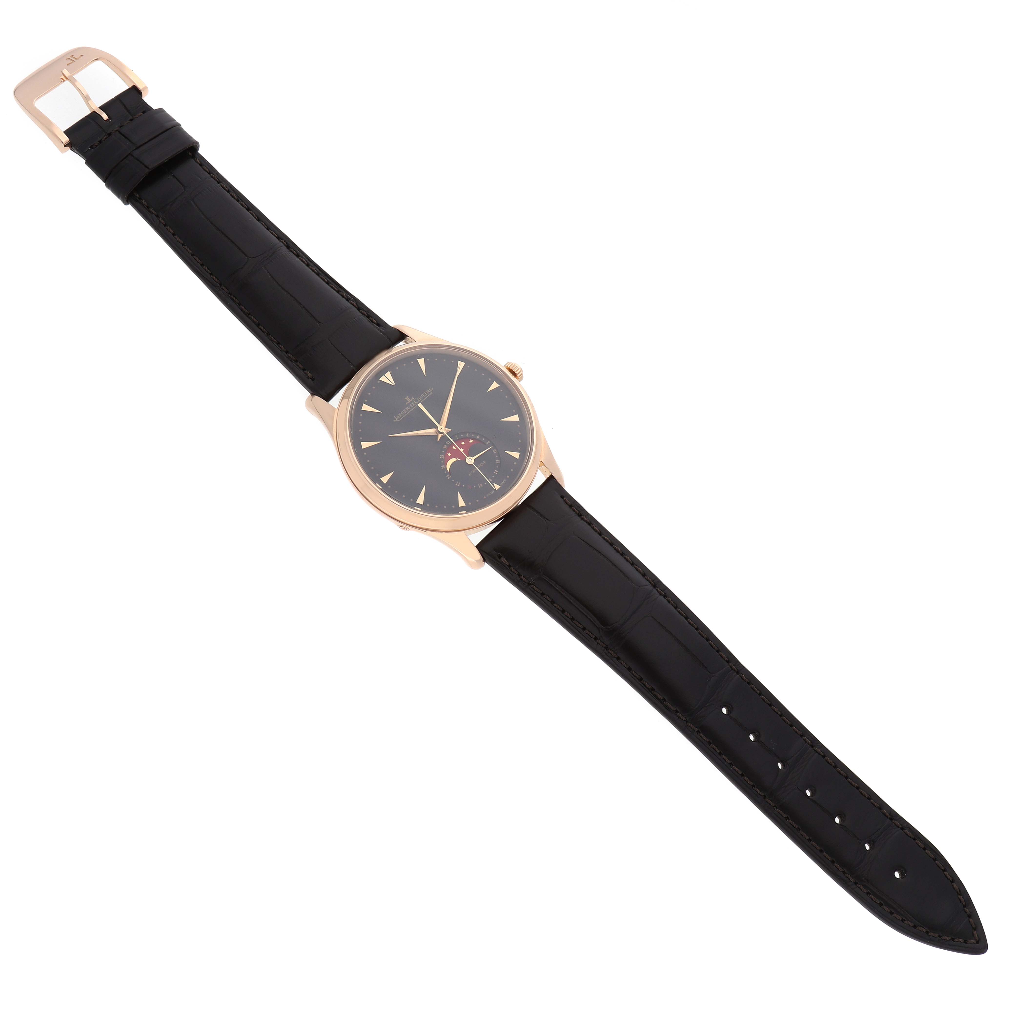 The Jaeger LeCoultre Master Q136256C Men's Rose Gold Brown Dial watch is shown from above, displaying the face, case, strap, and buckle.