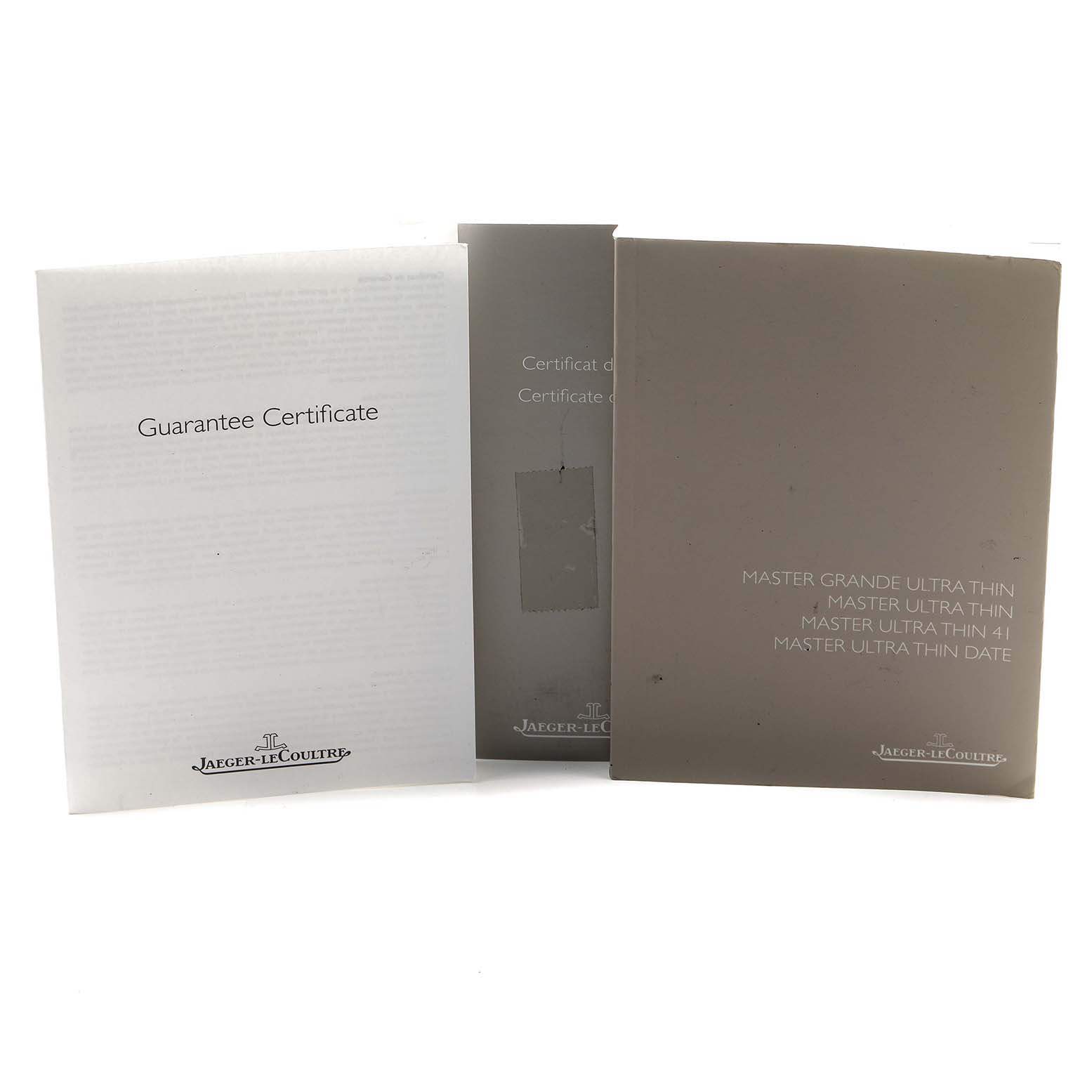 The image shows documents for the Jaeger LeCoultre Master Q1452507 Women's Rose Gold Silver Dial model, including a guarantee certificate and manuals.