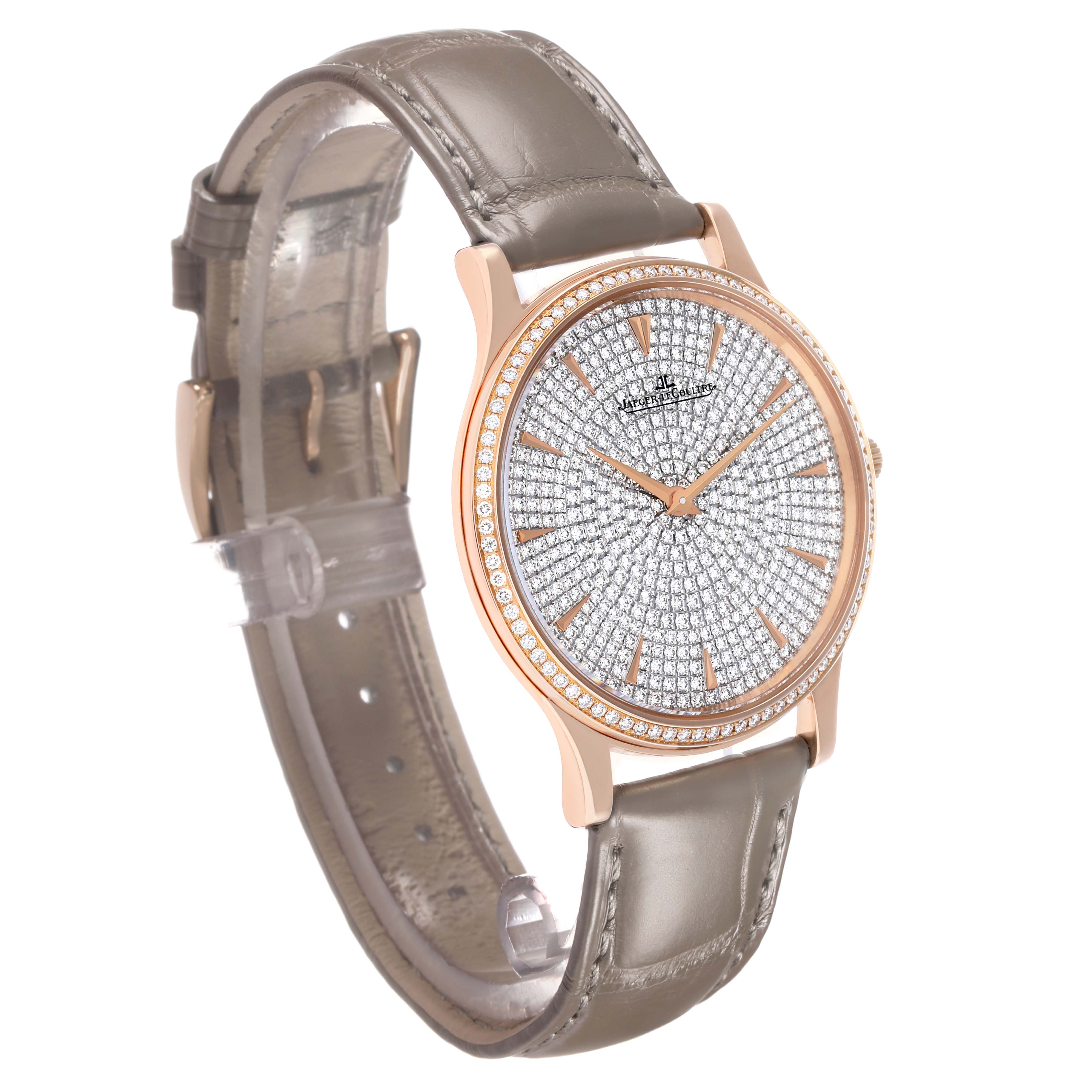 The Jaeger-LeCoultre Master model watch is shown at a three-quarter angle, highlighting its diamond-studded face, rose gold case, and leather strap.