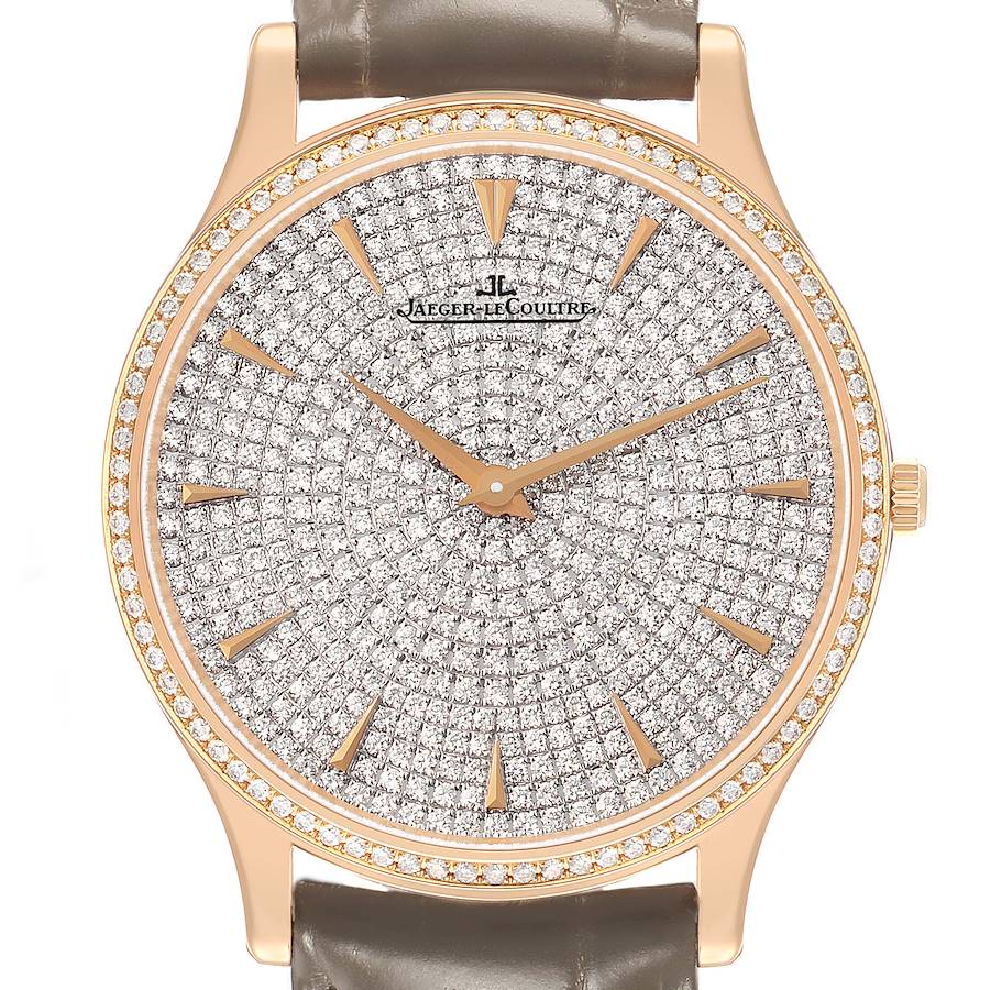 The Jaeger-LeCoultre Master model watch is shown from the front, featuring a gold case, diamond-encrusted dial, and gold markers.