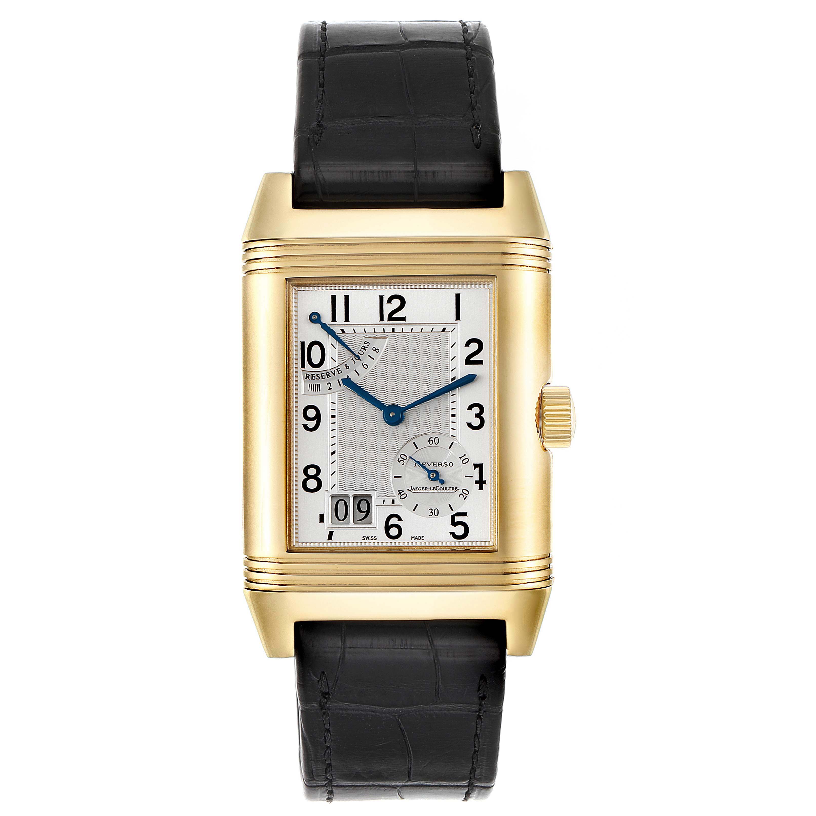 This Jaeger-LeCoultre Reverso model watch is shown from the front, displaying its rectangular dial, gold case, and black leather strap.