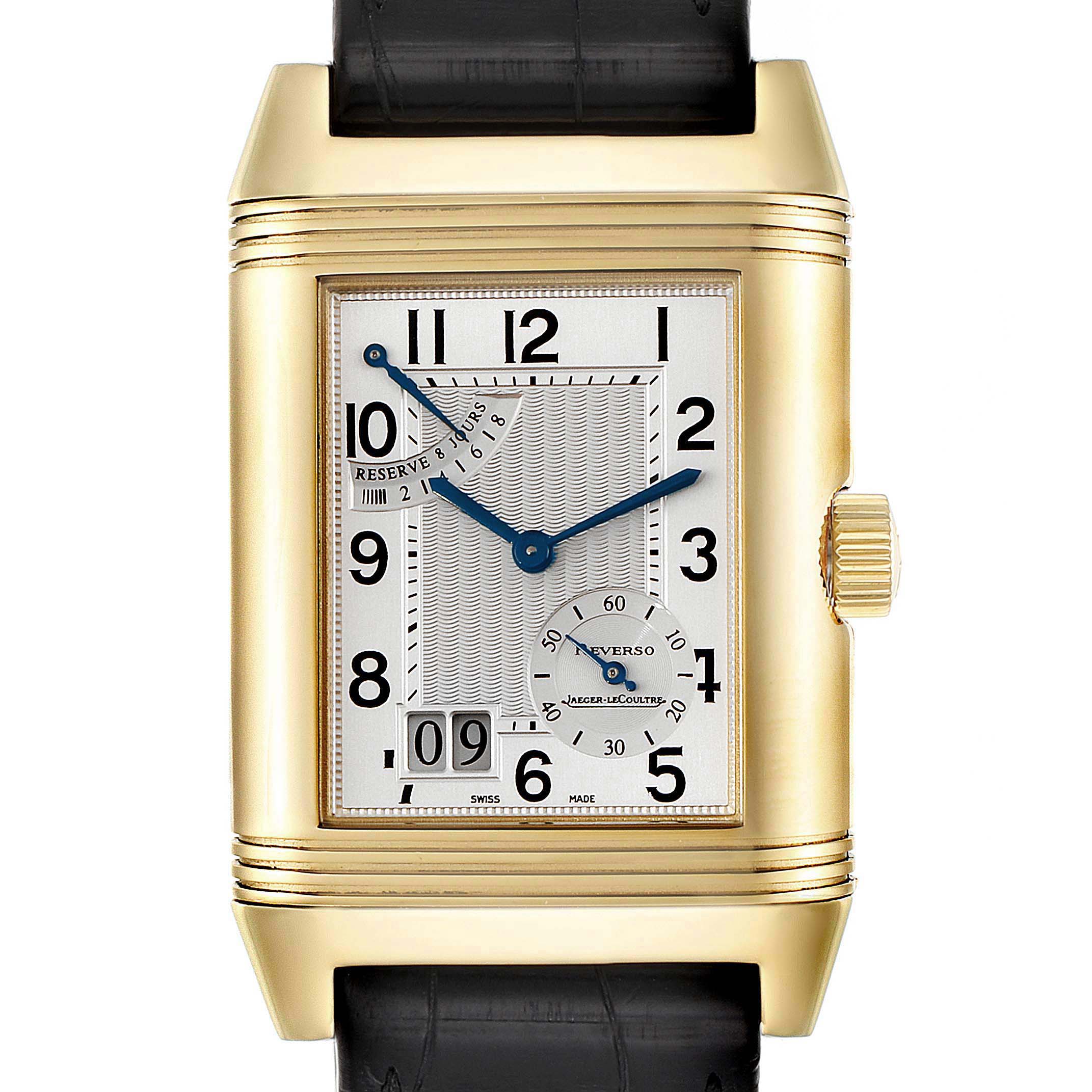 The image shows a front view of a Jaeger LeCoultre Reverso Q3001420 Men's Yellow Gold Silver Dial Q3001420 Men's Yellow Gold Silver Dial watch, displaying the dial, crown, and a portion of the watch band.