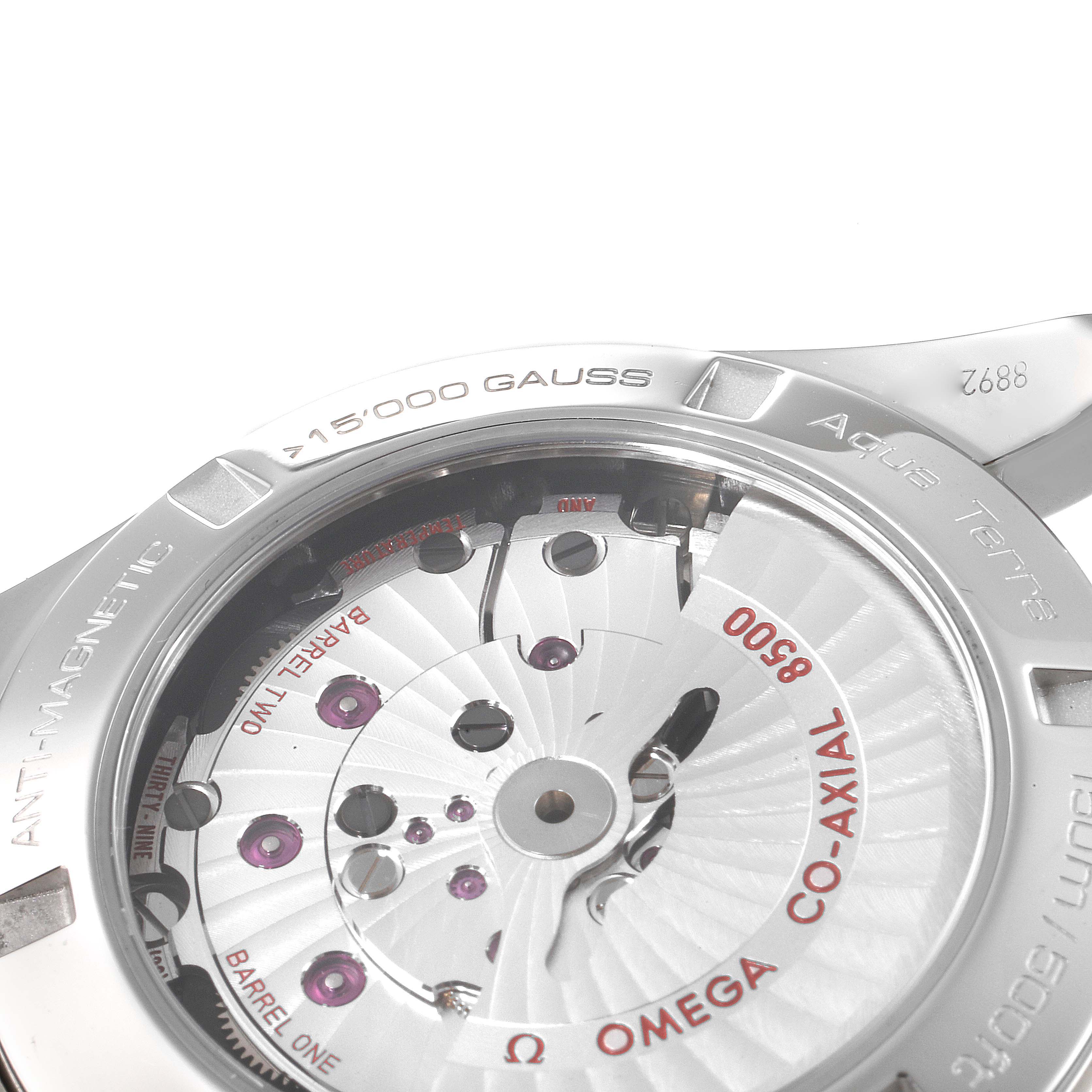 This image shows a close-up of the Omega Aqua Terra 231.10.42.21.03.006 Men
s Stainless Steel Blue Dial 231.10.42.21.03.006 Men
s Stainless Steel Blue Dial watch
s movement and case back.