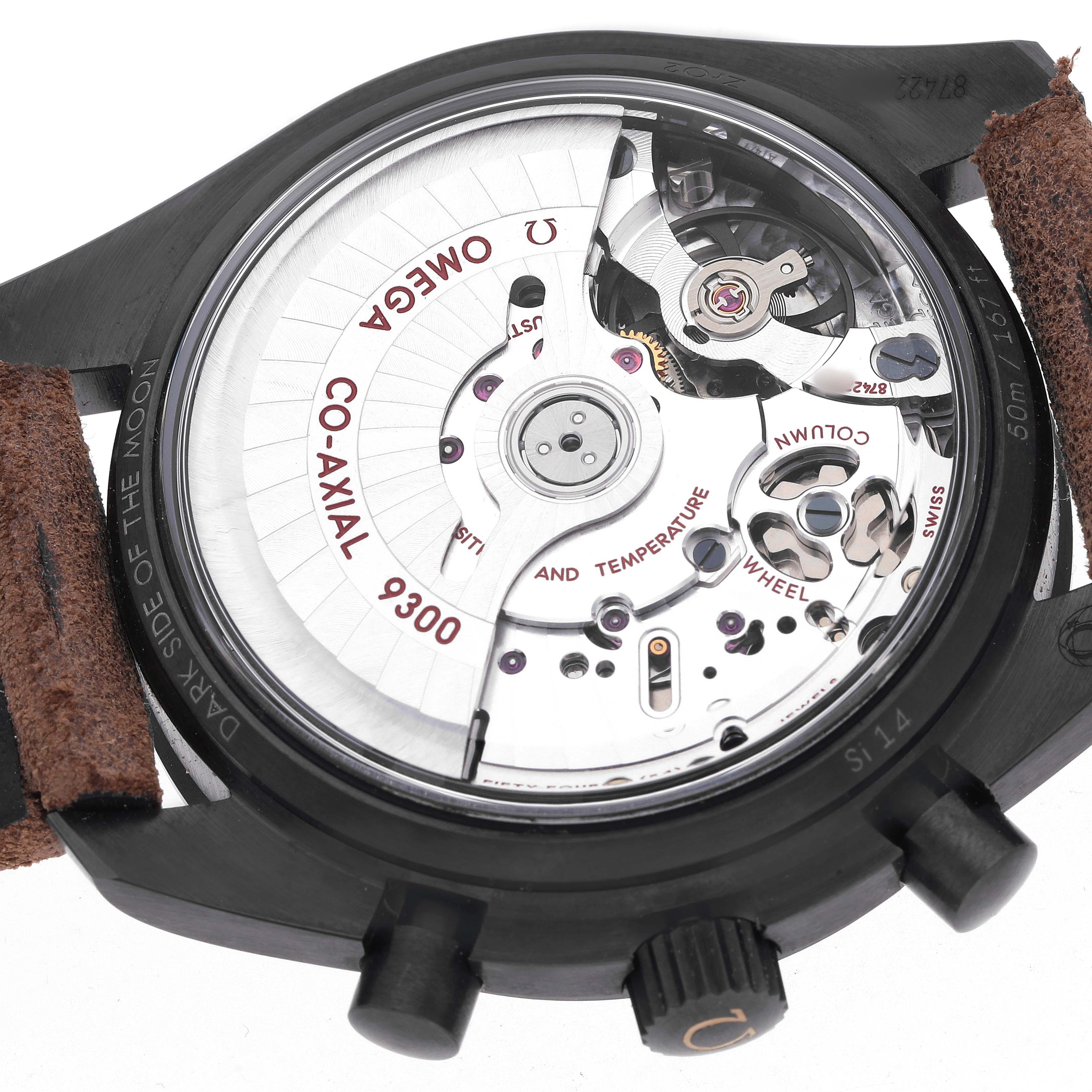 The image shows the back view of the Omega Speedmaster 311.92.44.51.01.006 Men's Ceramic Black Dial, focusing on the Co-Axial 9300 movement and Transparent case back.