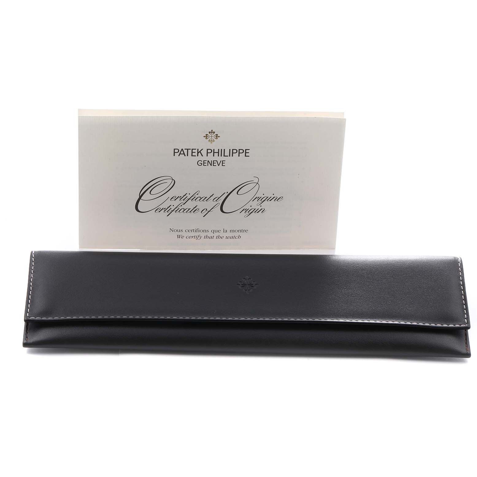 The image shows a Patek Philippe Calatrava 5123R Men's Rose Gold Silver Dial certificate and a case, viewed from the front.