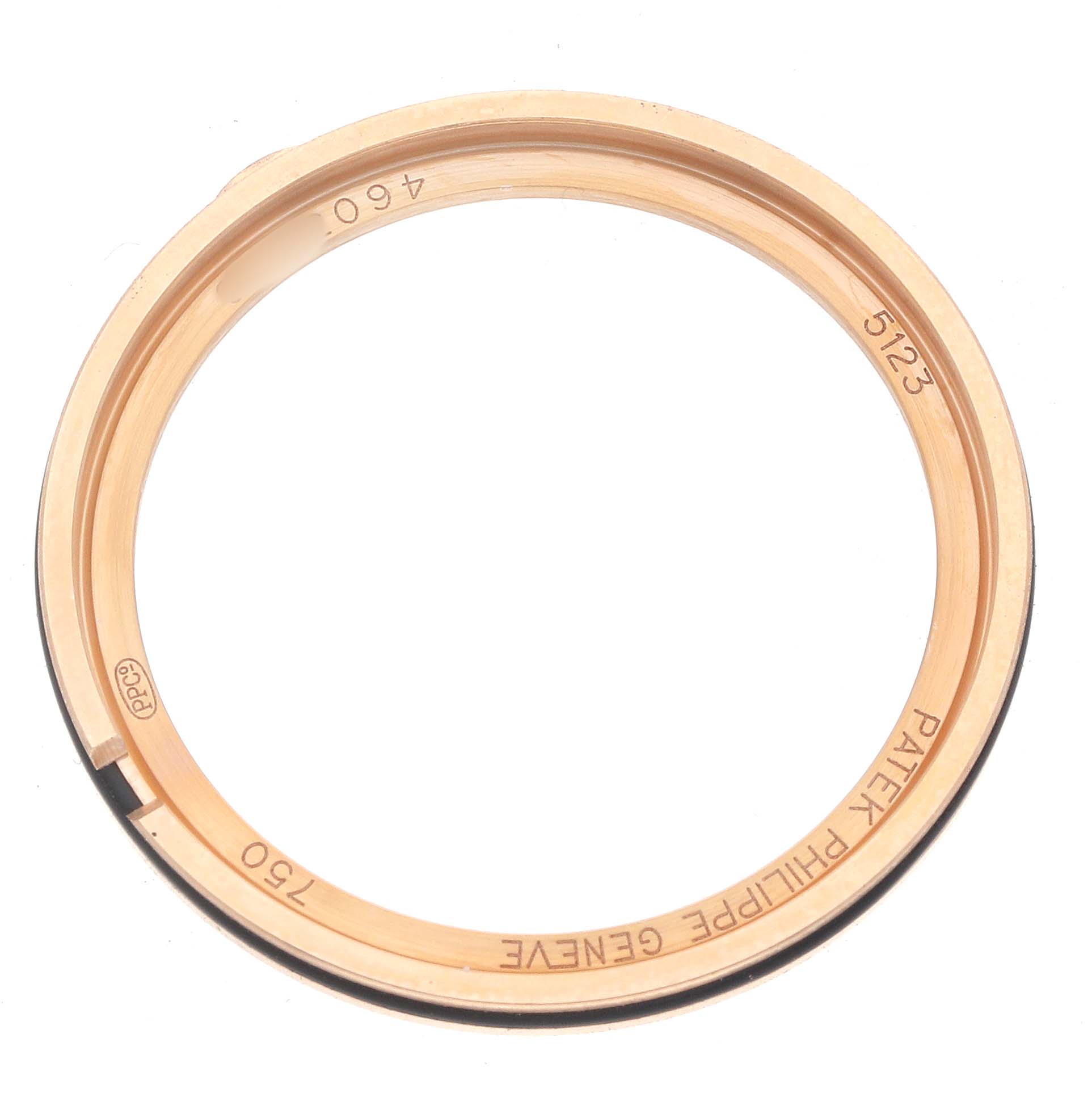 The image shows a Patek Philippe Calatrava 5123R Men's Rose Gold Silver Dial bezel ring viewed from above, displaying engravings.