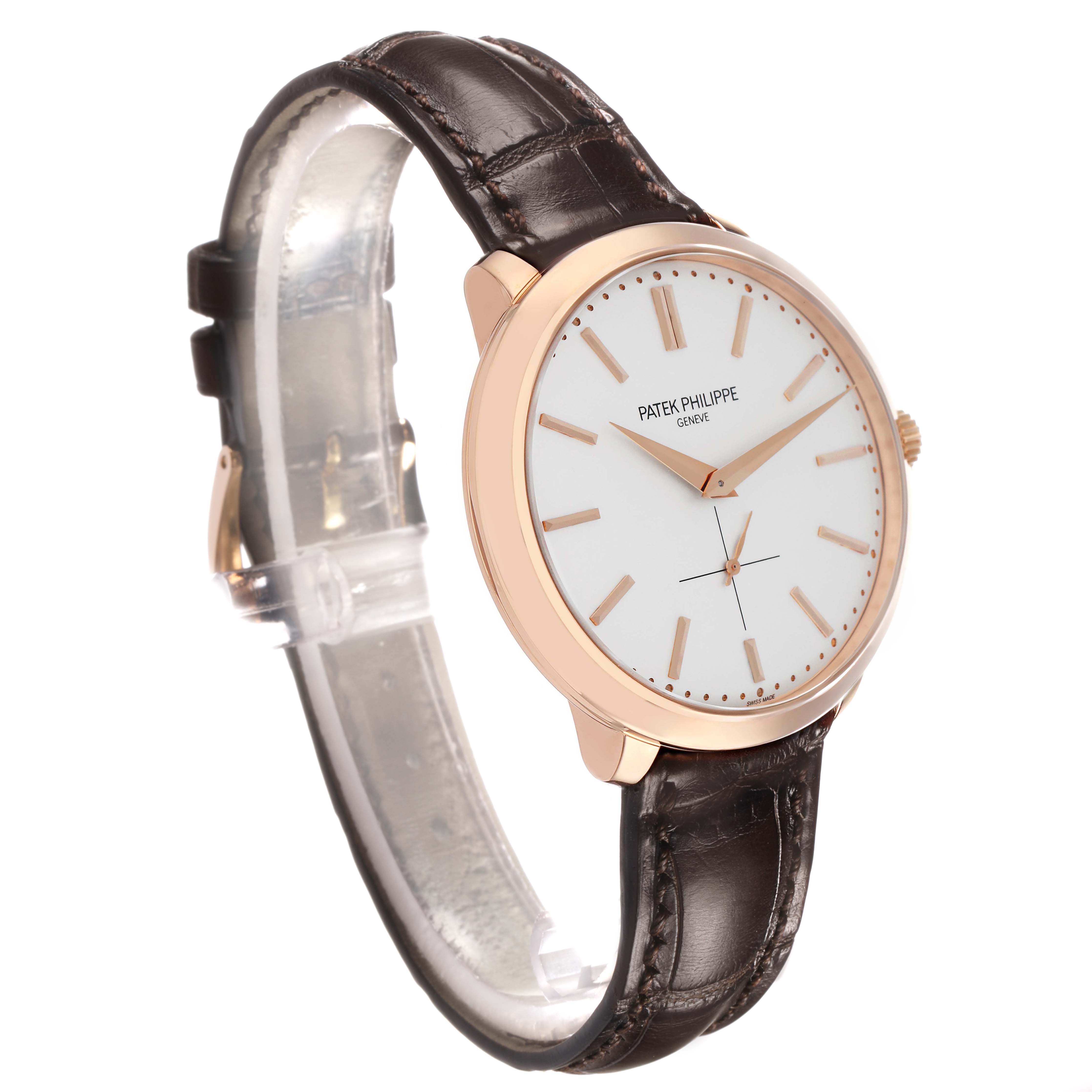 The Patek Philippe Calatrava 5123R Men's Rose Gold Silver Dial watch is shown at a slight angle, displaying the face and part of the brown leather strap.