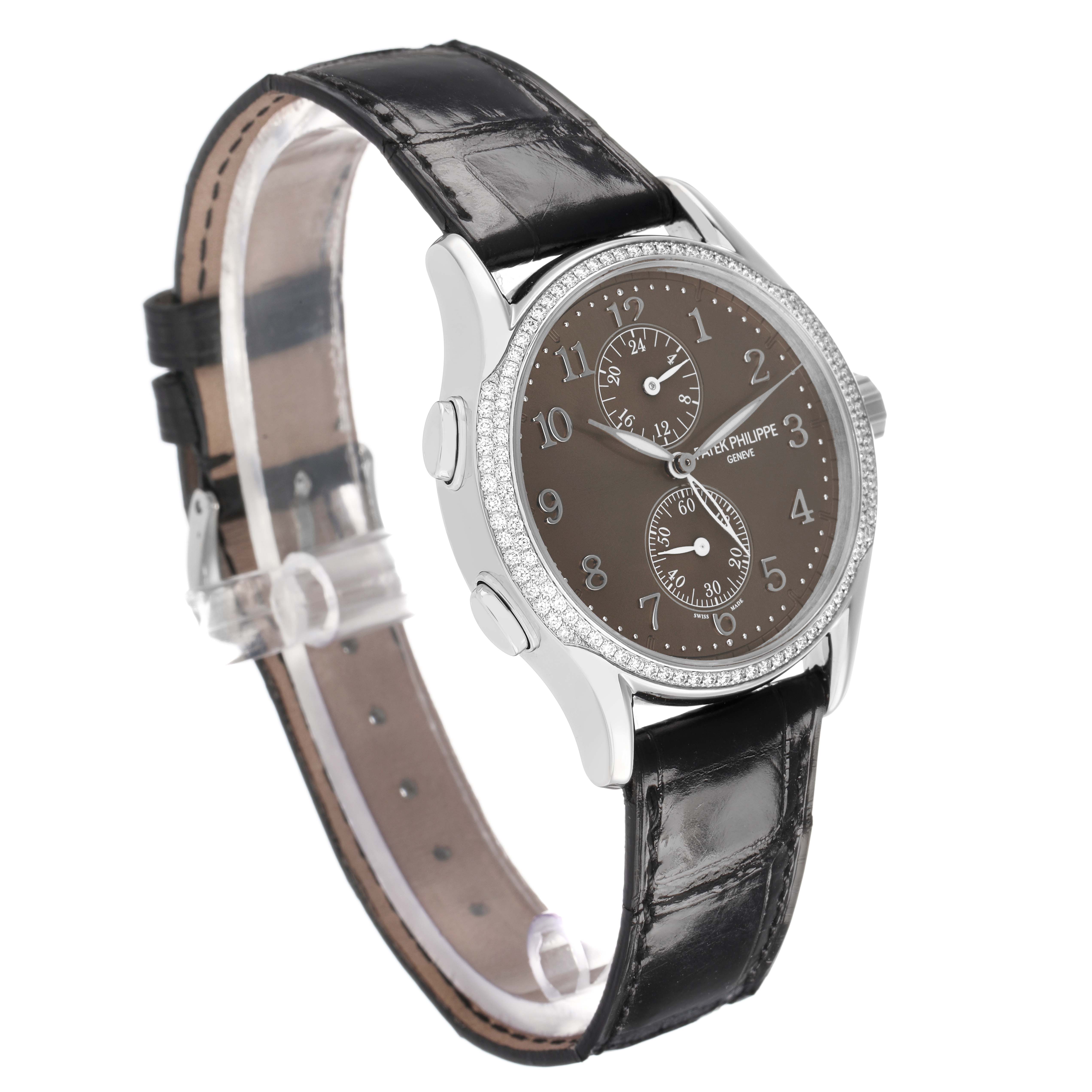 The Patek Philippe Calatrava 7134G Men's White Gold Brown Dial watch is shown from a three-quarter angle, highlighting the face, bezel, and leather strap.