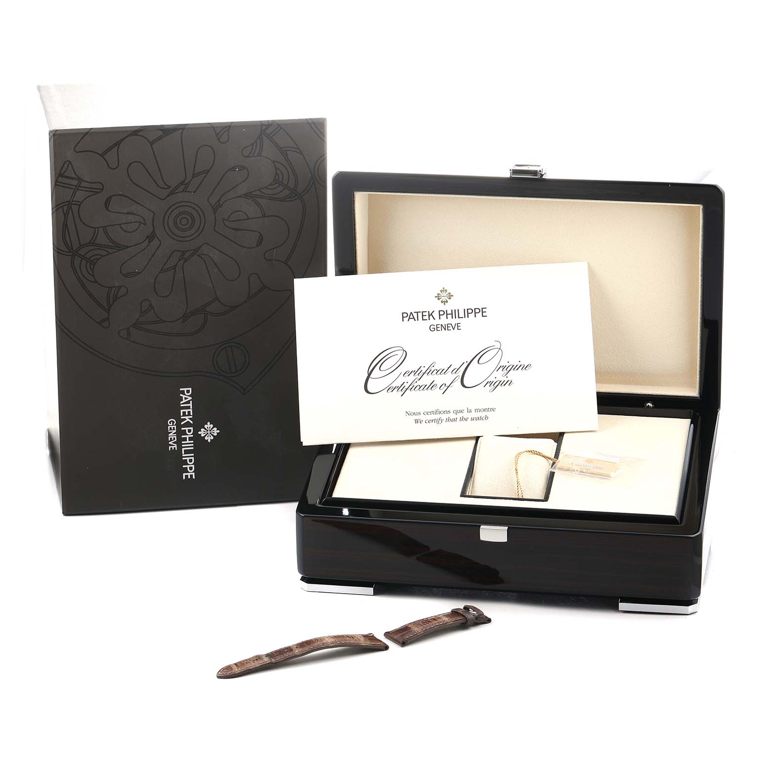 The image shows a Patek Philippe Calatrava 7134G Men's White Gold Brown Dial box, certificate, and straps, viewed from the front and above.