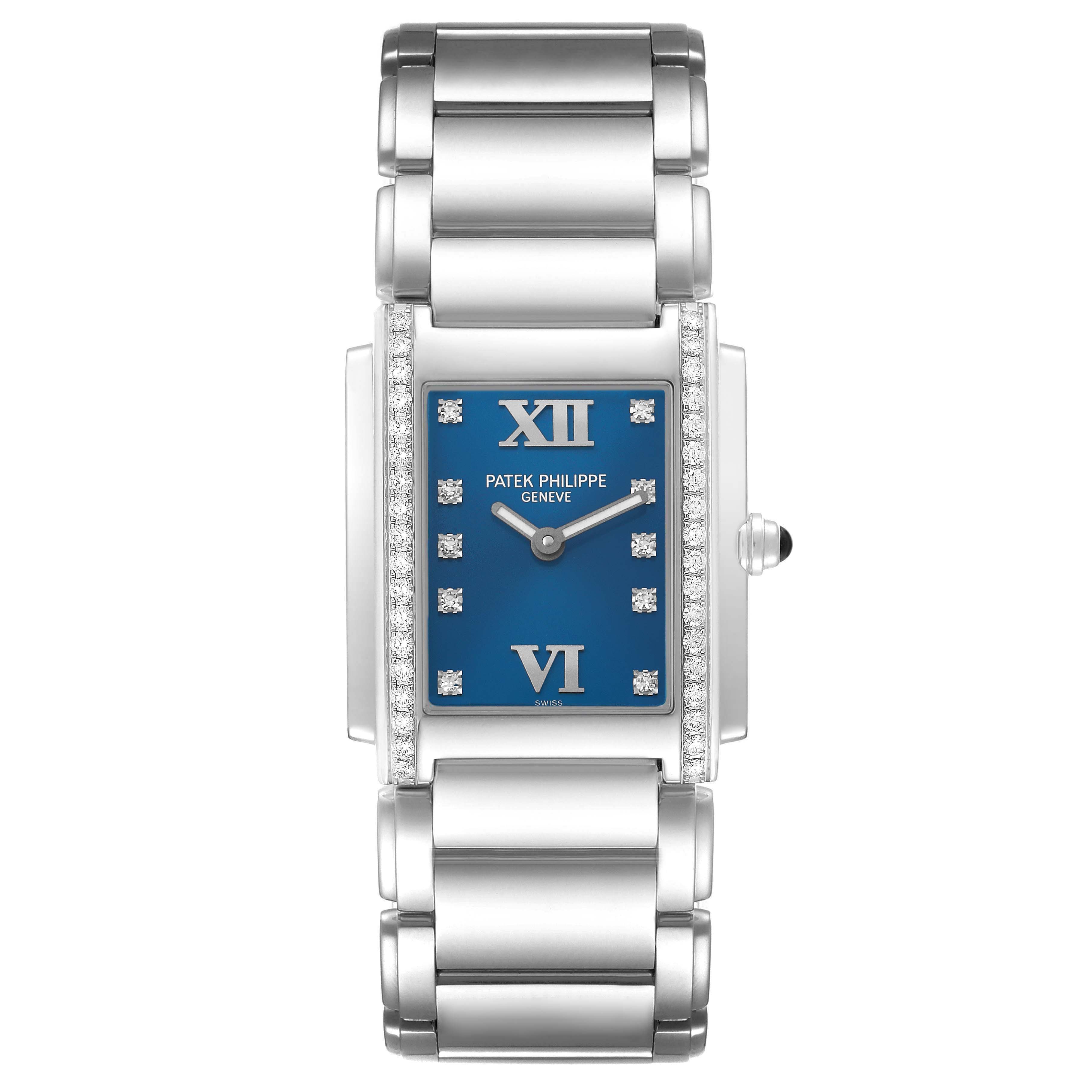 The image shows a front view of the Patek Philippe Twenty-4 4910/10A Women's Stainless Steel Blue Dial watch, highlighting its blue dial, diamond bezel, and metal bracelet.