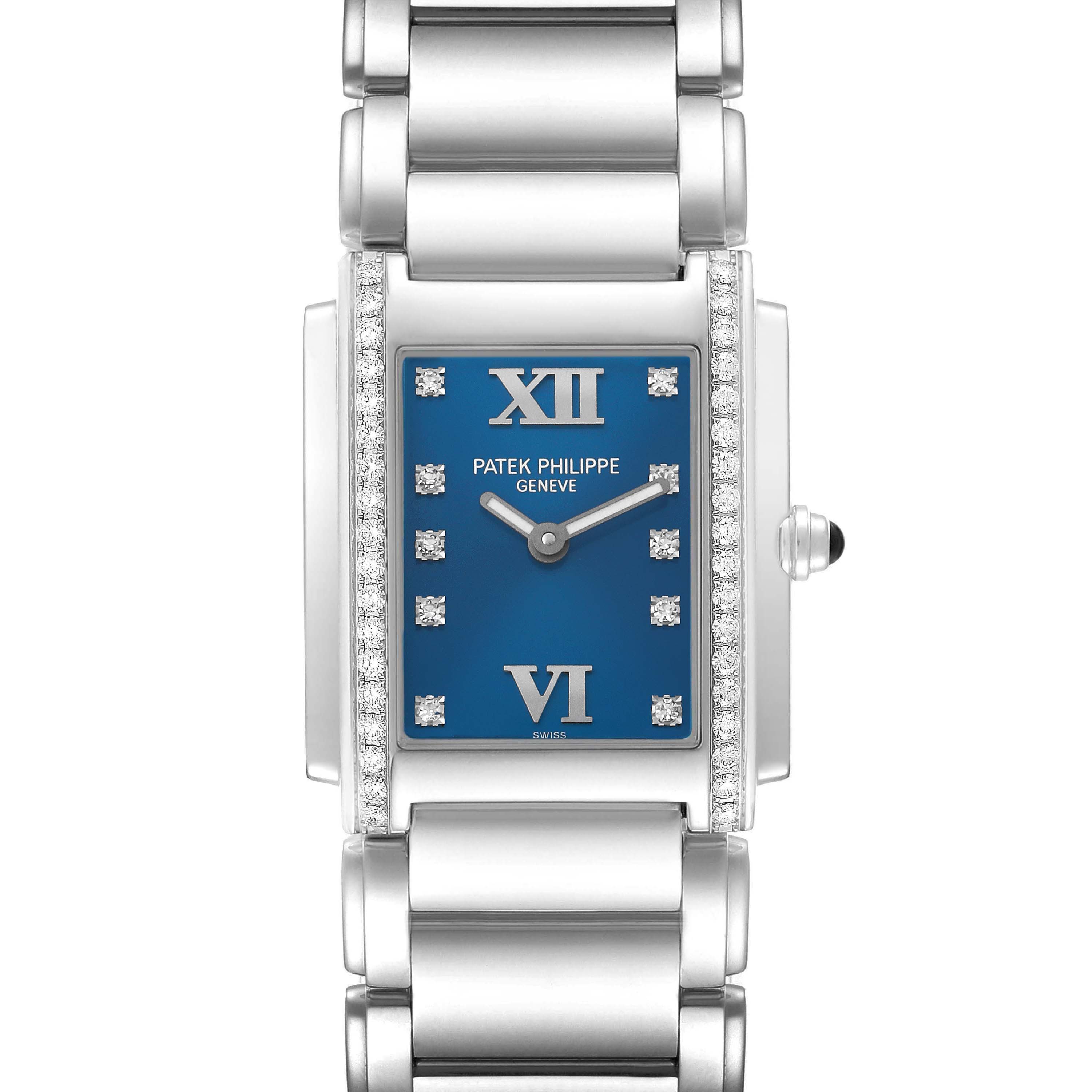 This image shows a front view of the Patek Philippe Twenty-4 4910/10A Women's Stainless Steel Blue Dial watch, highlighting its blue dial, Roman numerals, and diamond accents.