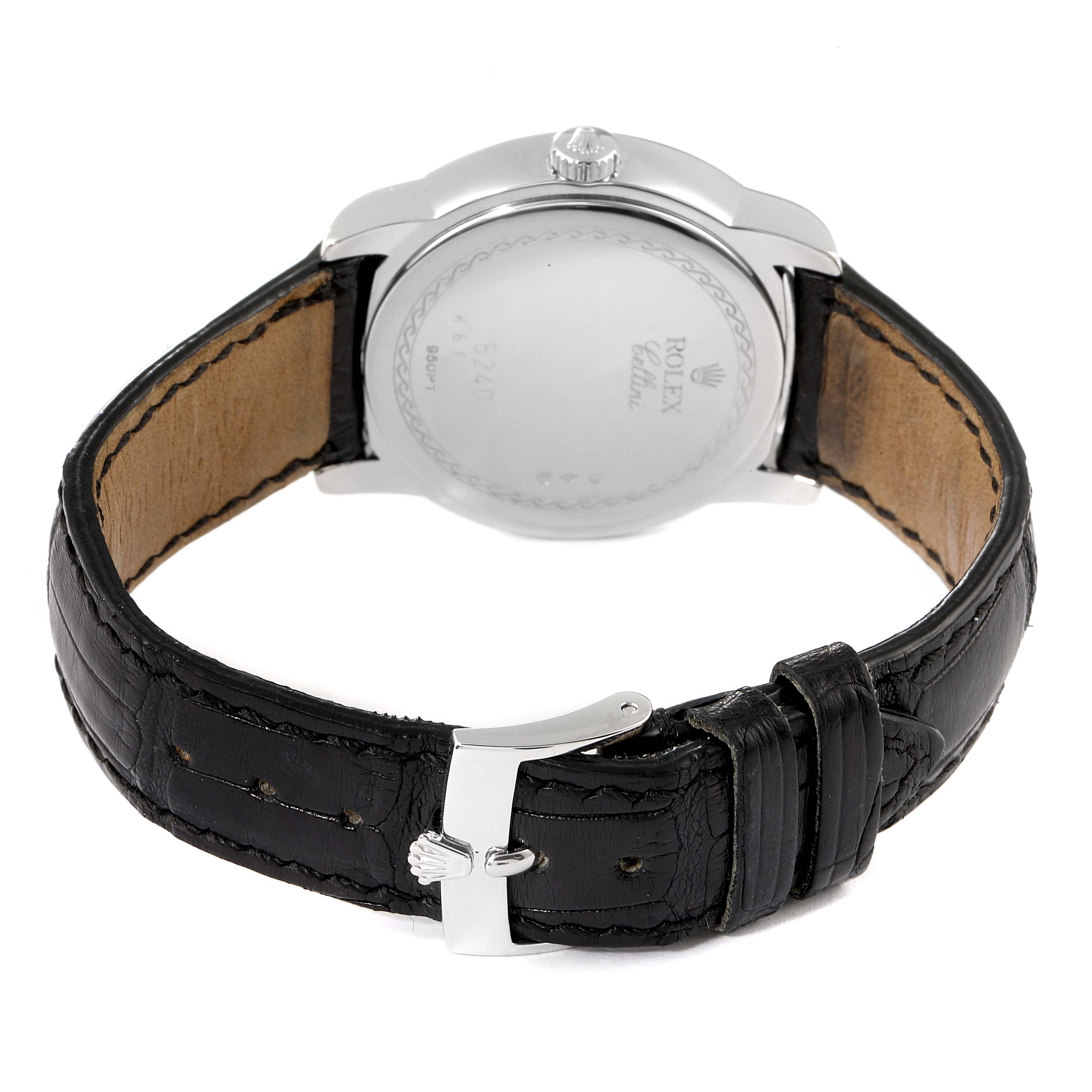 The image shows the back view of a Rolex Cellini 5240 Men's Platinum Mother of Pearl Dial 5240 Men's Platinum Mother of Pearl Dial watch, highlighting its case back, crown, and leather strap with a buckle.