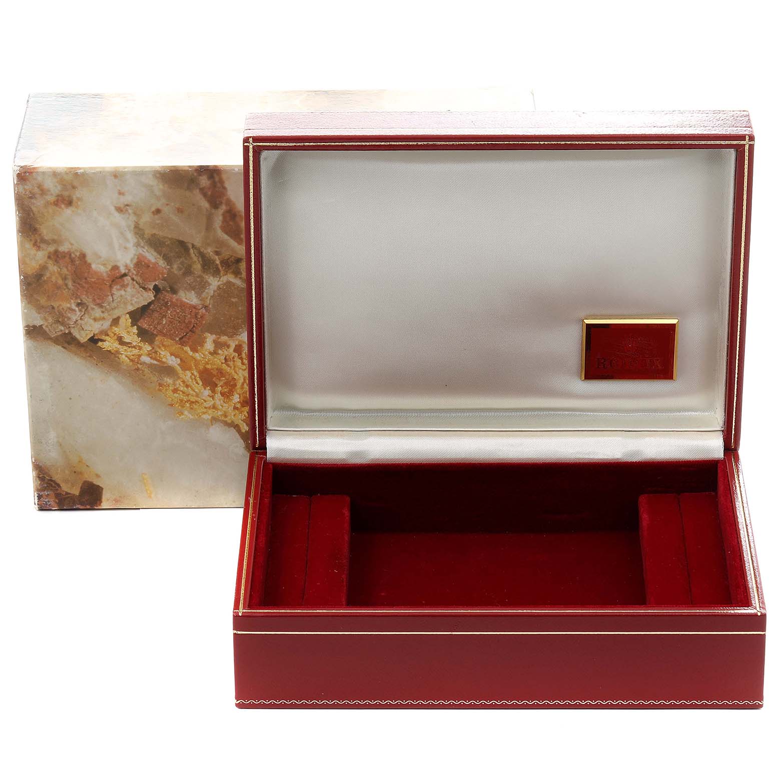 This image shows the open box for a Rolex President 6916 Women
s Stainless Steel White Dial 6916 Women
s Stainless Steel White Dial model watch, featuring a plush red interior and a marbled exterior.