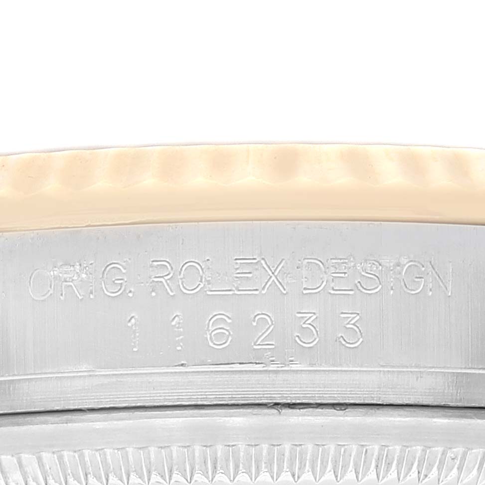 Close-up of the Rolex Datejust 116233 Men's Steel and Gold (two tone) Champagne Dial 116233 Men's Steel and Gold (two tone) Champagne Dial showing the engraved "Original Rolex Design" and model number on the case.
