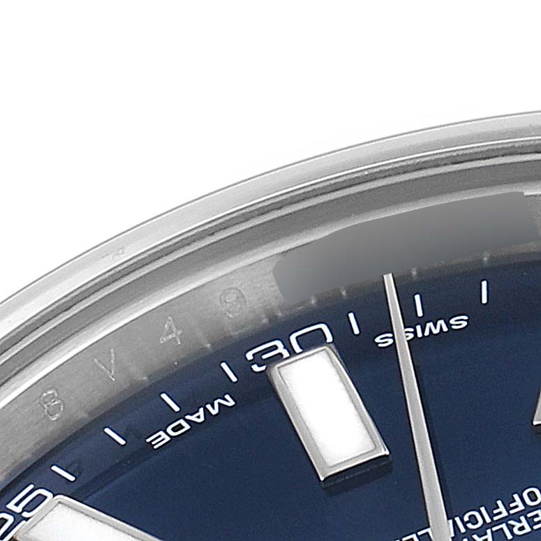 This image shows a close-up of the dial and edge of the bezel of a Rolex Datejust 41 116300 Men
s Stainless Steel Blue Dial 116300 Men
s Stainless Steel Blue Dial watch.