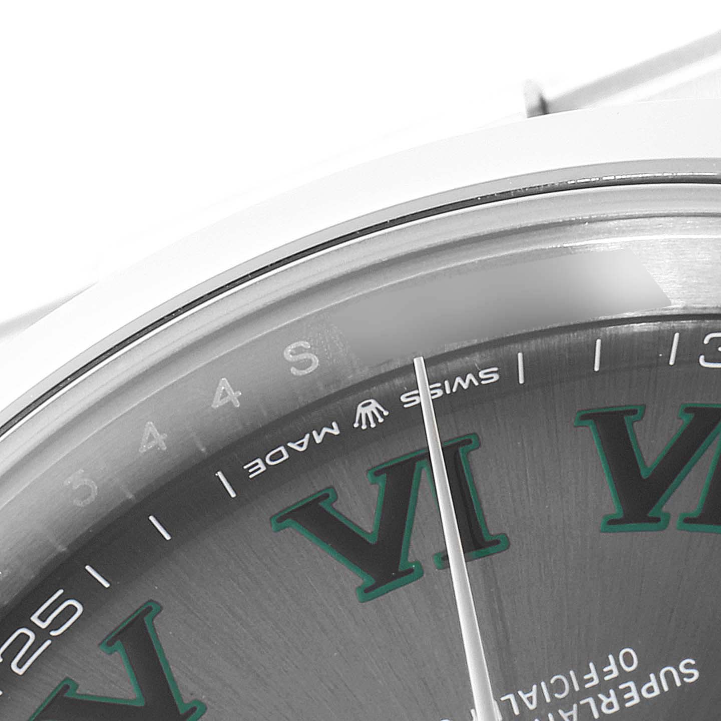 This image shows a close-up of the dial of a Rolex Datejust 41 126300 Men
s Stainless Steel Grey Dial 126300 Men
s Stainless Steel Grey Dial watch, focusing on the "Swiss Made" lettering and part of the Roman numeral hour markers.
