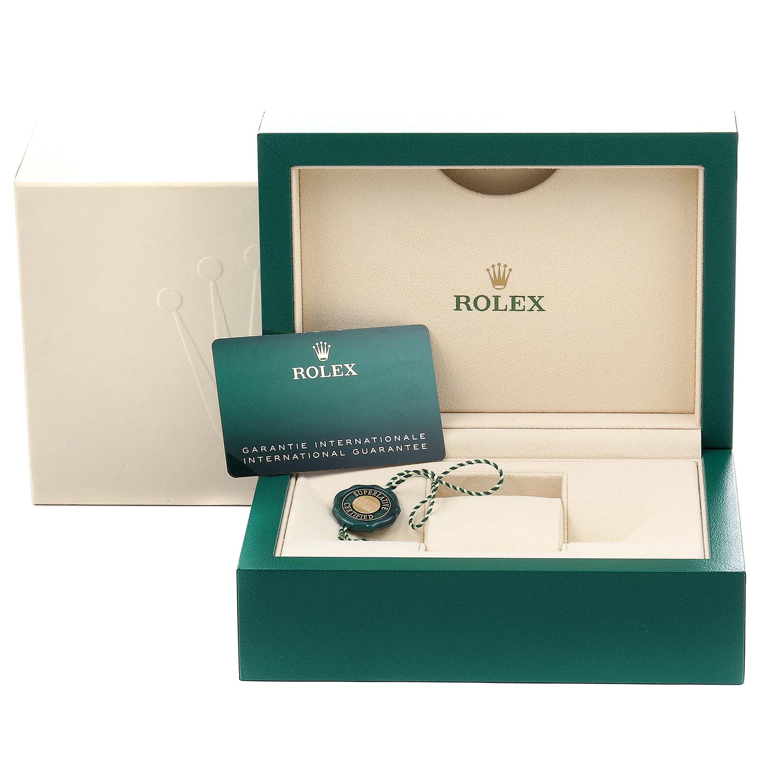 The image shows a Rolex Datejust 41 126334 Men
s Stainless Steel Blue Dial 126334 Men
s Stainless Steel Blue Dial box and accessories, including an open box, a green guarantee card, and a green tag with a string.