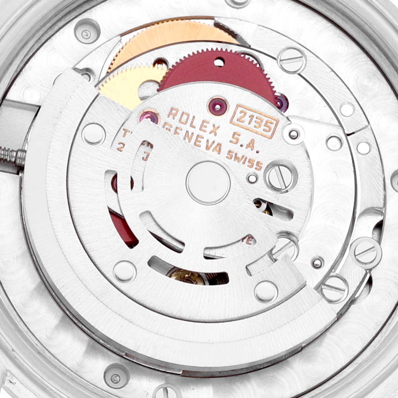 The image shows an up-close view of the movement from a Rolex Mid-Size 68274 Women
s Stainless Steel Silver Dial 68274 Women
s Stainless Steel Silver Dial model watch, highlighting gears and the oscillating weight.